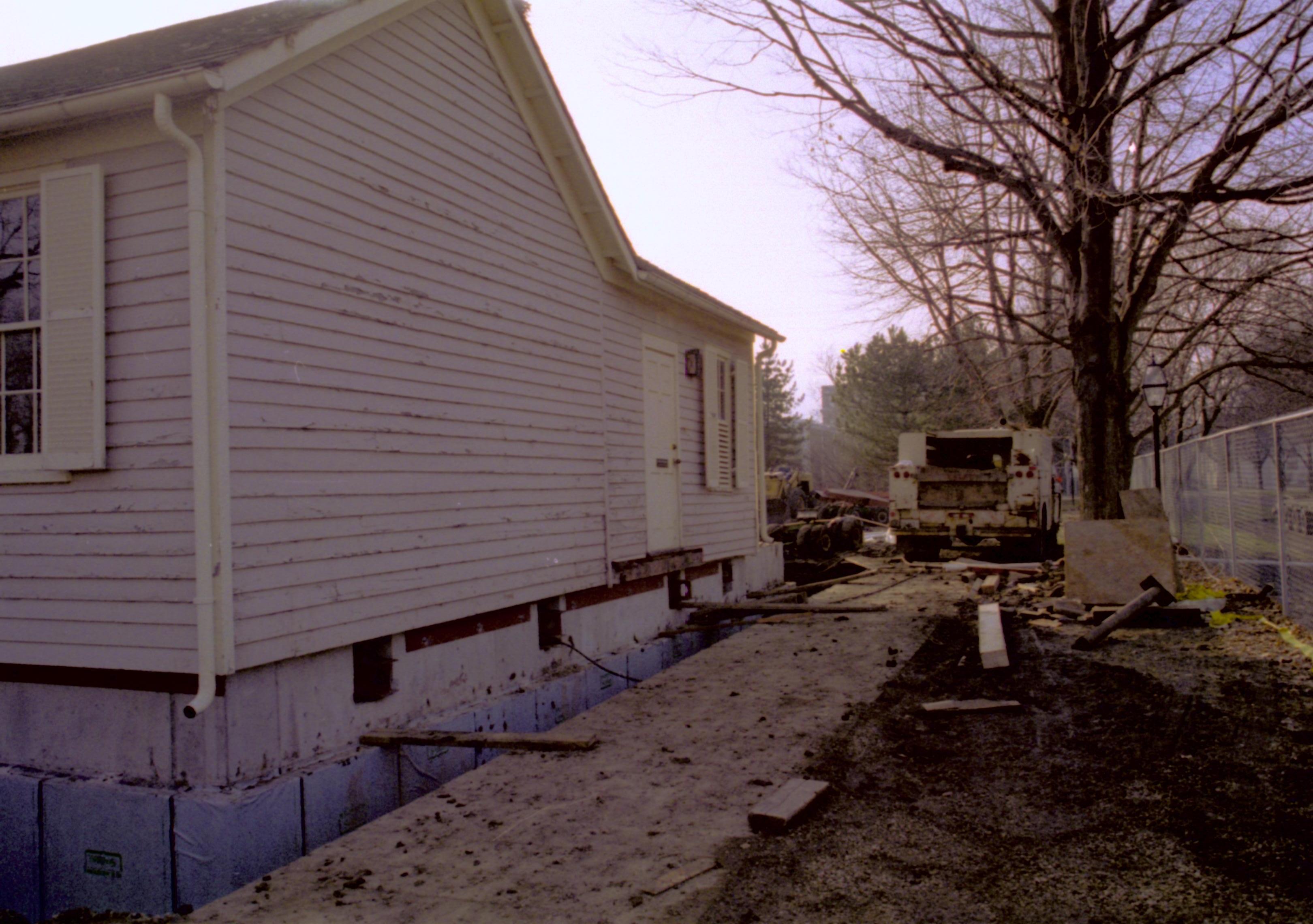 Corneau House immediately after lowered onto new foundation; Northeast corner visible Lincoln Home NHS- Sprigg House, Corneau House, Roll N1 exp 2 Corneau House, restoration, construction