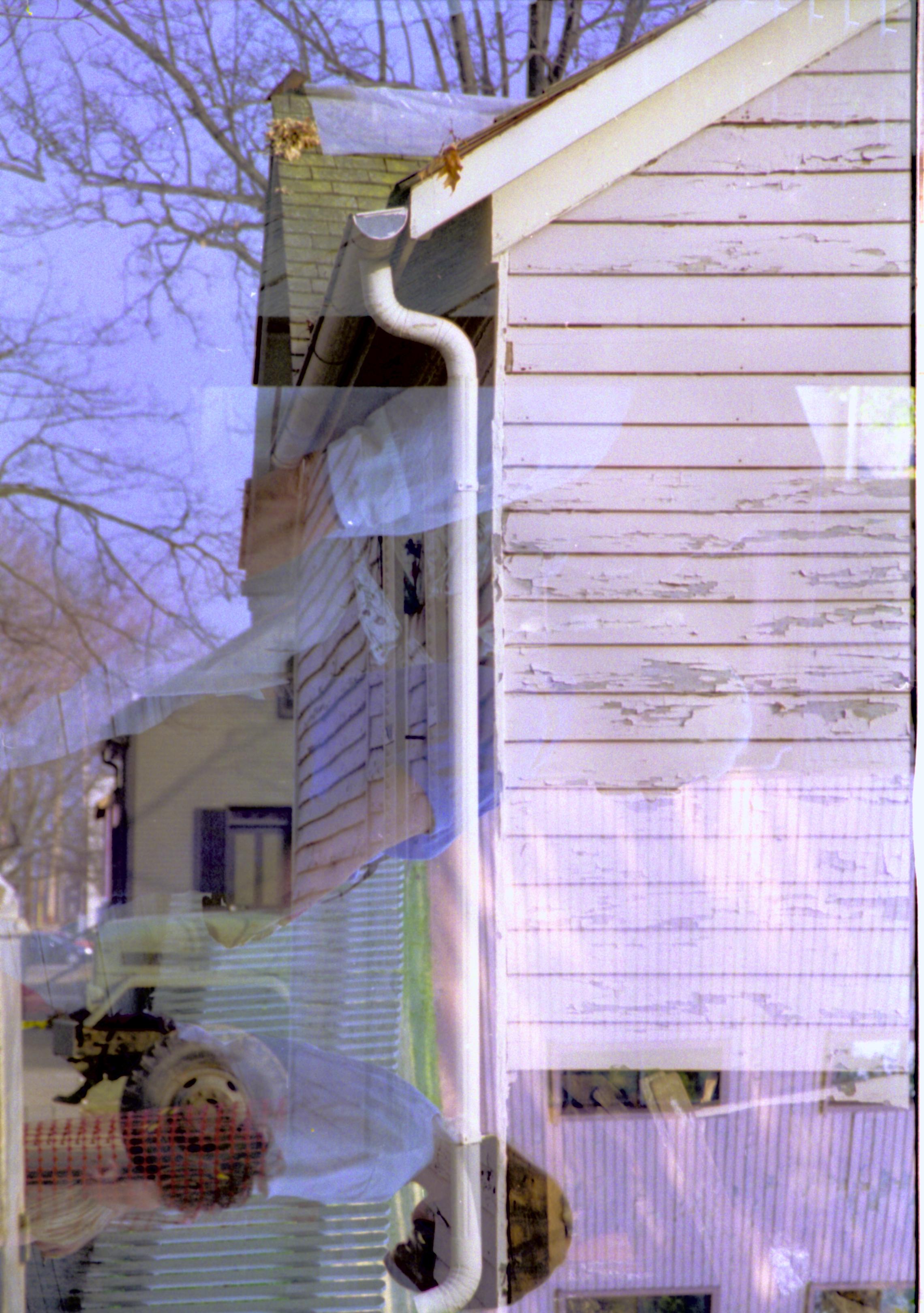 Superimposed: Southwest corner of Sprigg and Renolds in front of Cook House, South wall Lincoln Home NHS- Sprigg House, Corneau House, Roll N1 exp 10 Corneau House, restoration, costume