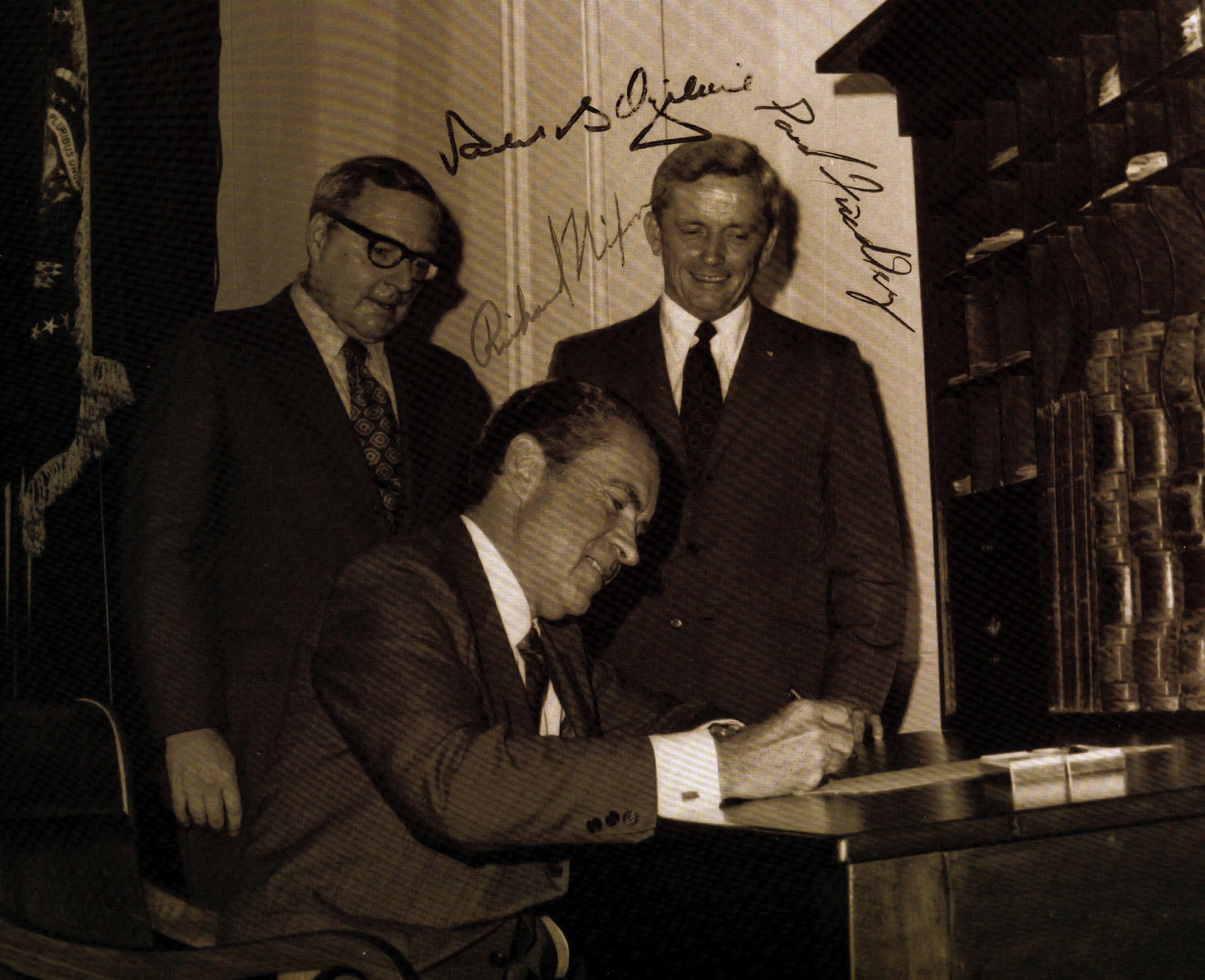 President Nixon signing legislation autograph photo Old State House, Nixon