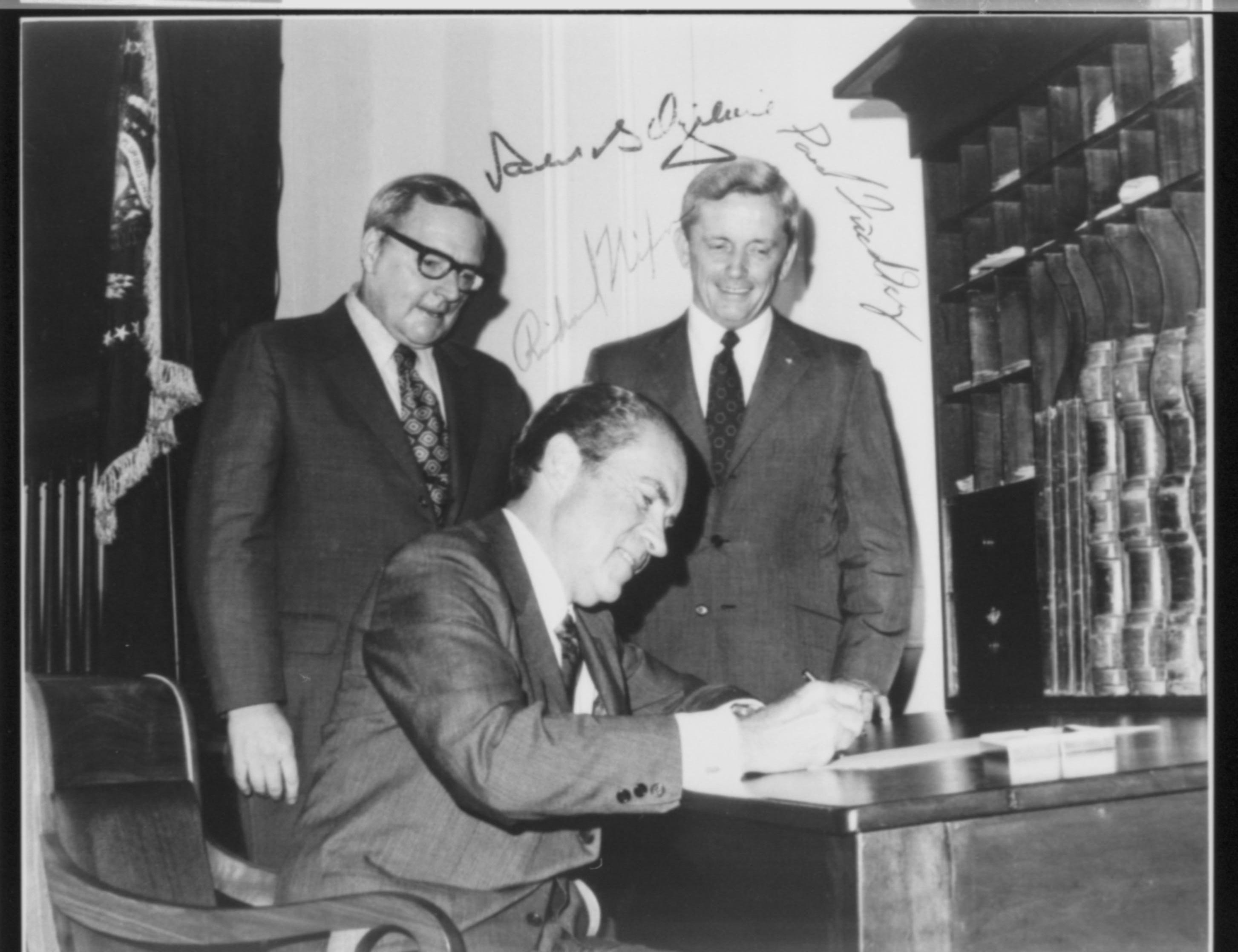President Nixon signing legislation 2K; autograph photo Old State House, Nixon