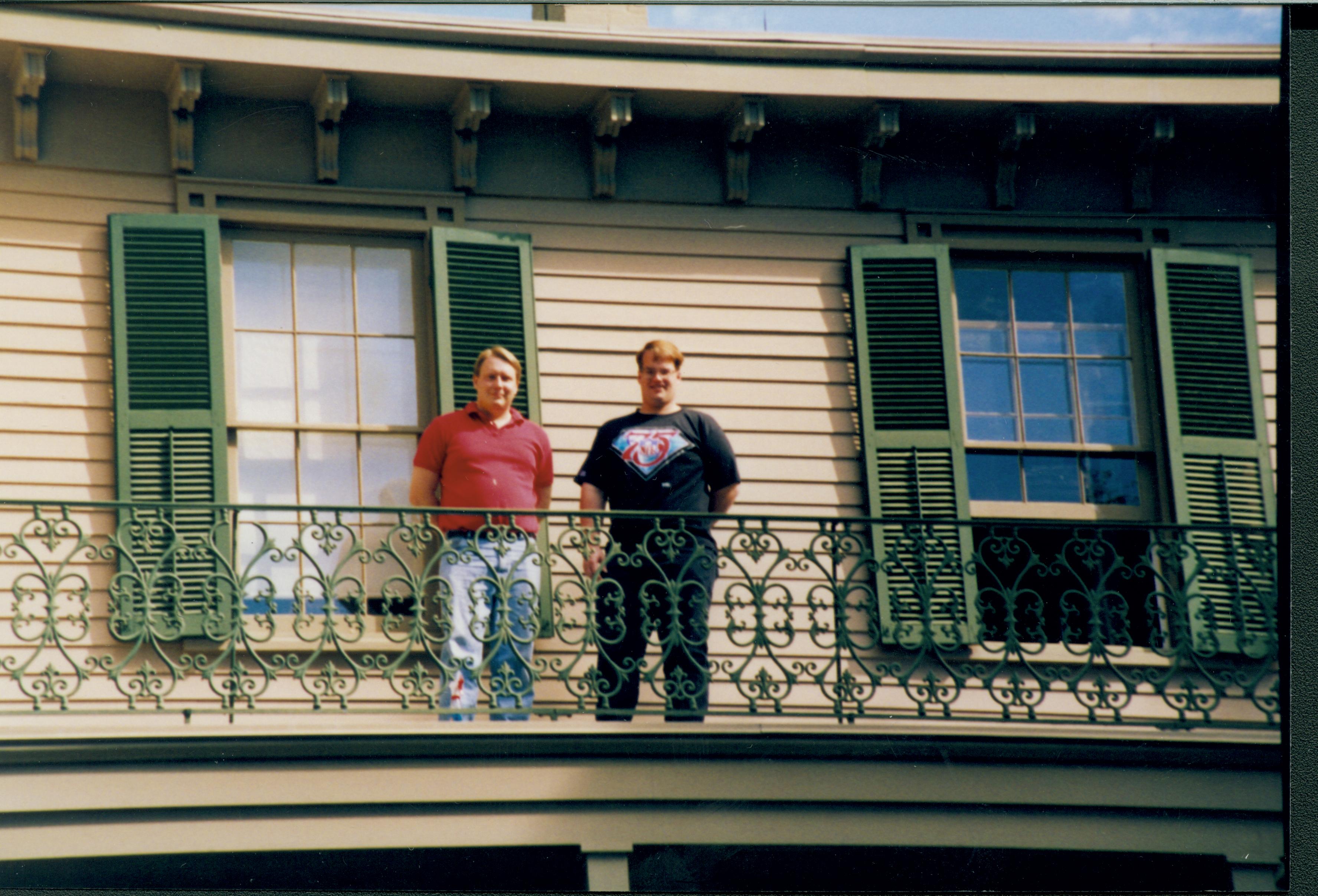 Museum Aides Dylan Bauer and Dan Foust standing on the balcony over the Lincoln Home South porch. Looking North.  Access was through the Trunk Room window staff, Museum, Lincoln Home