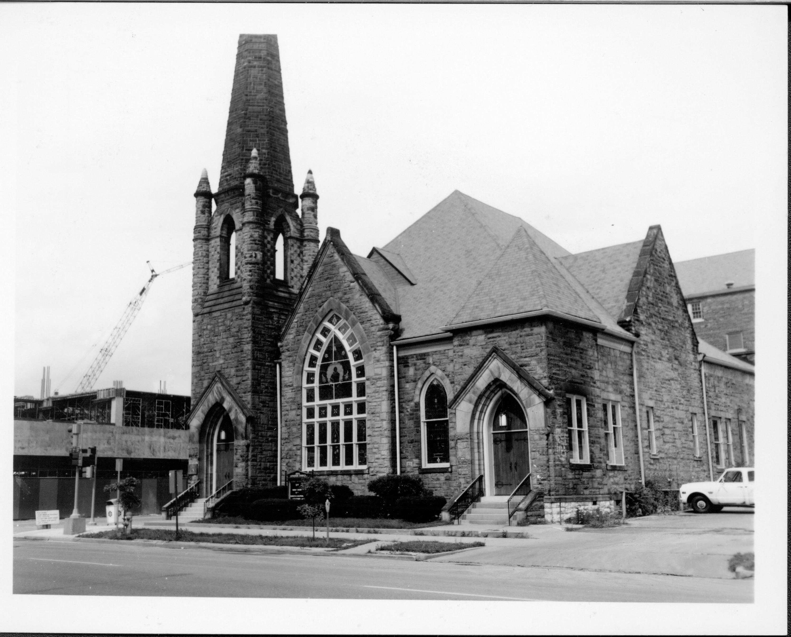 Grace Lutheran Church with Lincoln Library being built in background left. Looking Northeast.  Library was completed in 1976. Grace Lutheran Church, Lincoln Library