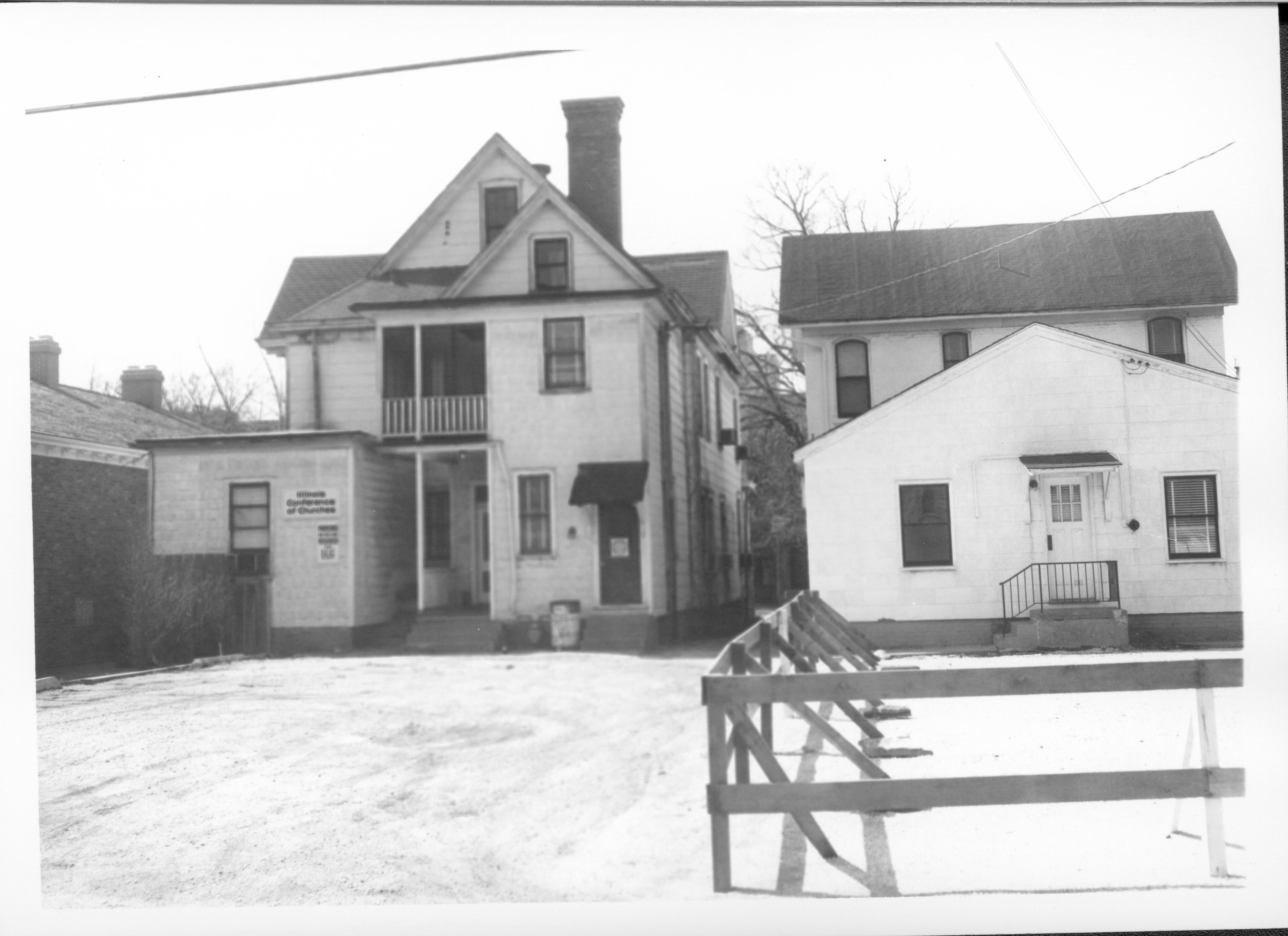 Backyards of the Homes of Dr. Albert T. Kwedar (right) and Eugene McNally et ux (left) on Block 7, Lots 4 & 5.  Area is now Visitor Center along 7th Street. Looking West along 7th Street south of Capitol Visitor Center, parking lot, Kwedar, McNally