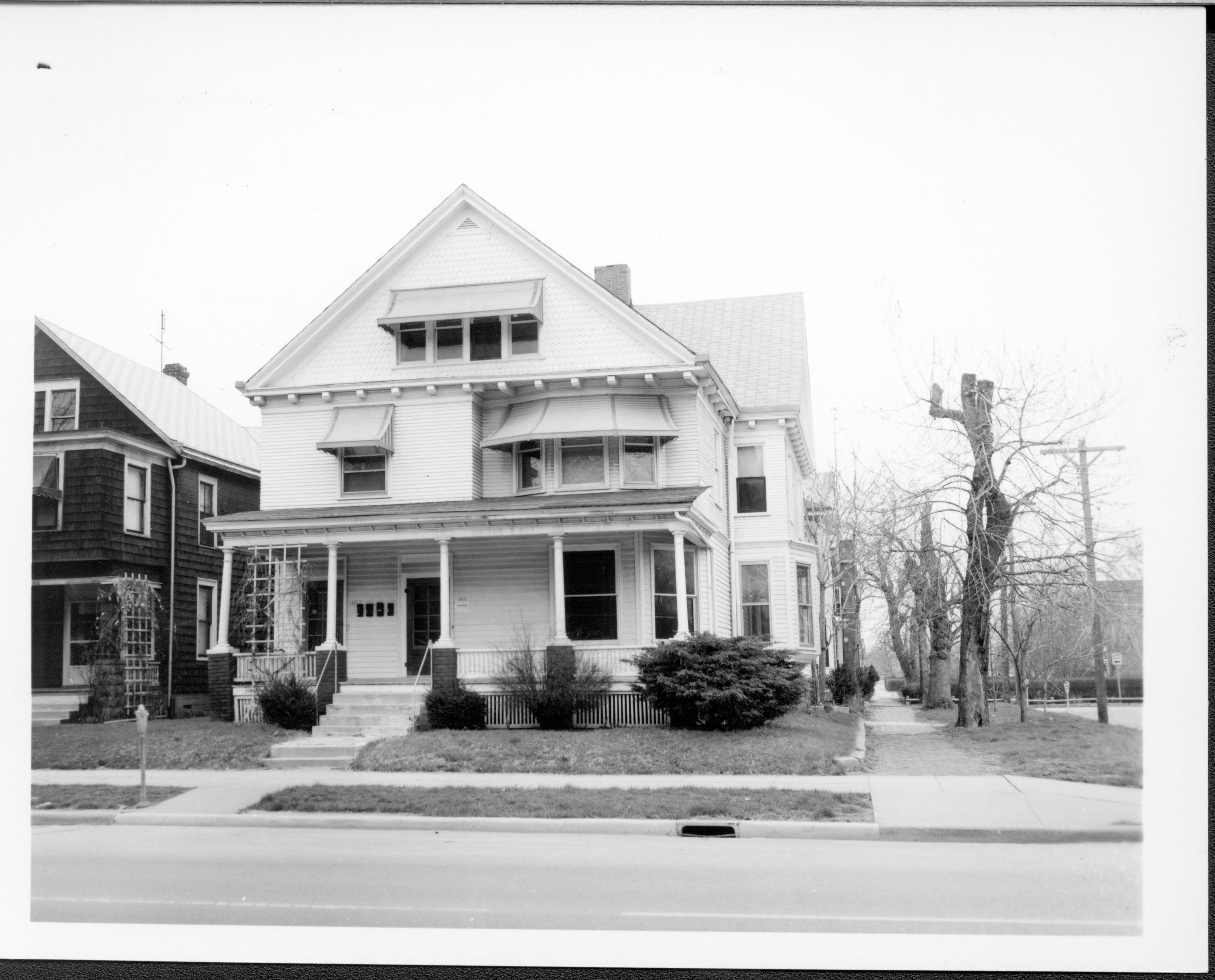 Home owned by William Hermes in use as apartments, Block 7 Lot 8.  Jackson St. visible on right, home owned by Eleanor Pruett on left.  Visitor Center located here now. Looking east along 7th and Jackson Streets Hermes, Pruett, Vistior Center, 7th Street, Jackson Street