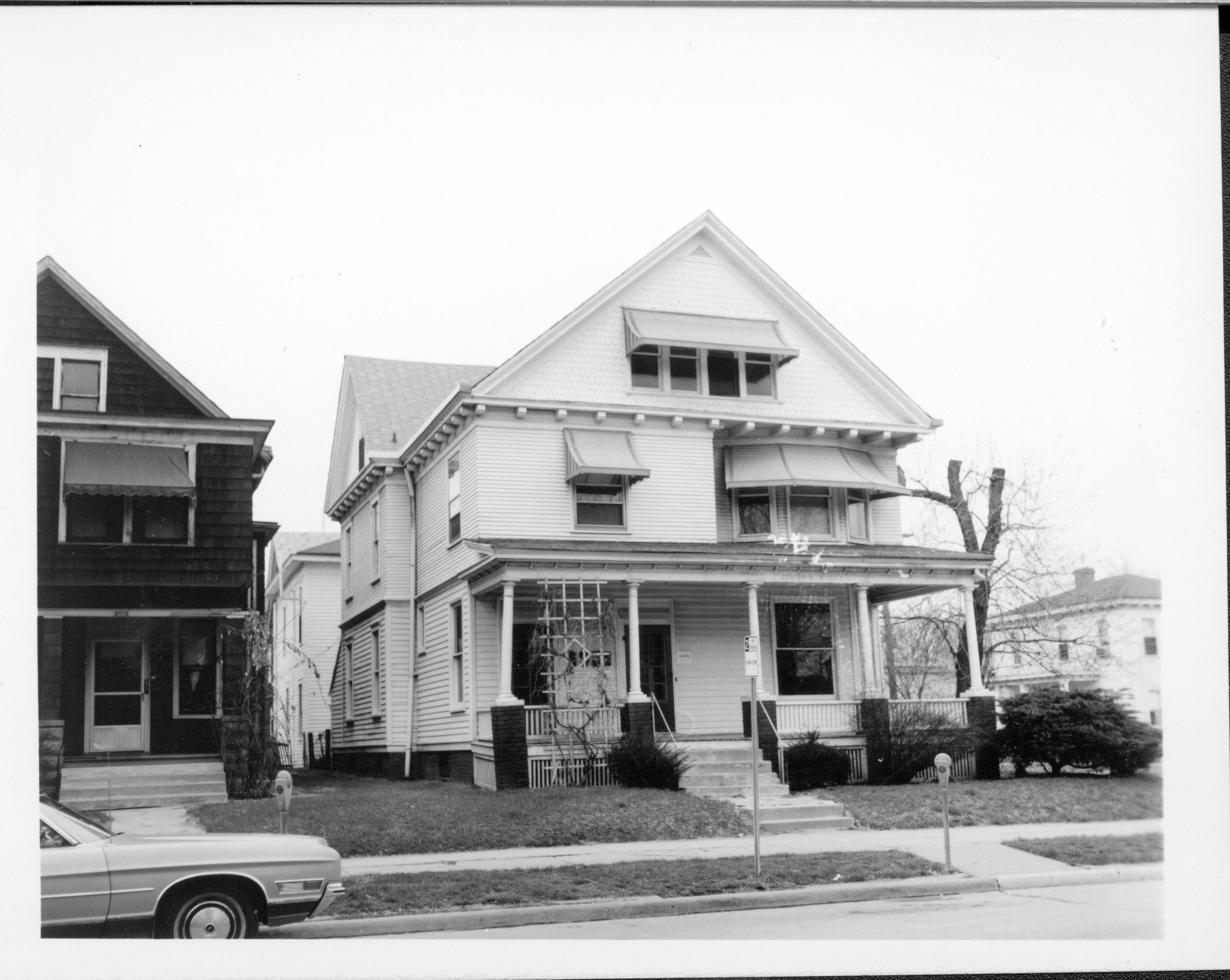 Home owned by William Hermes in use as apartments, Block 7, Lot 8 along 7th Street.  Now the location of the Visitor Center.  Home owned by Eleanor Pruett on left, home owned by Hugh Garvey in right background Looking East/Southeast along 7th Street Hermes, Pruett, Visitor Center, 7th Street, Garvey