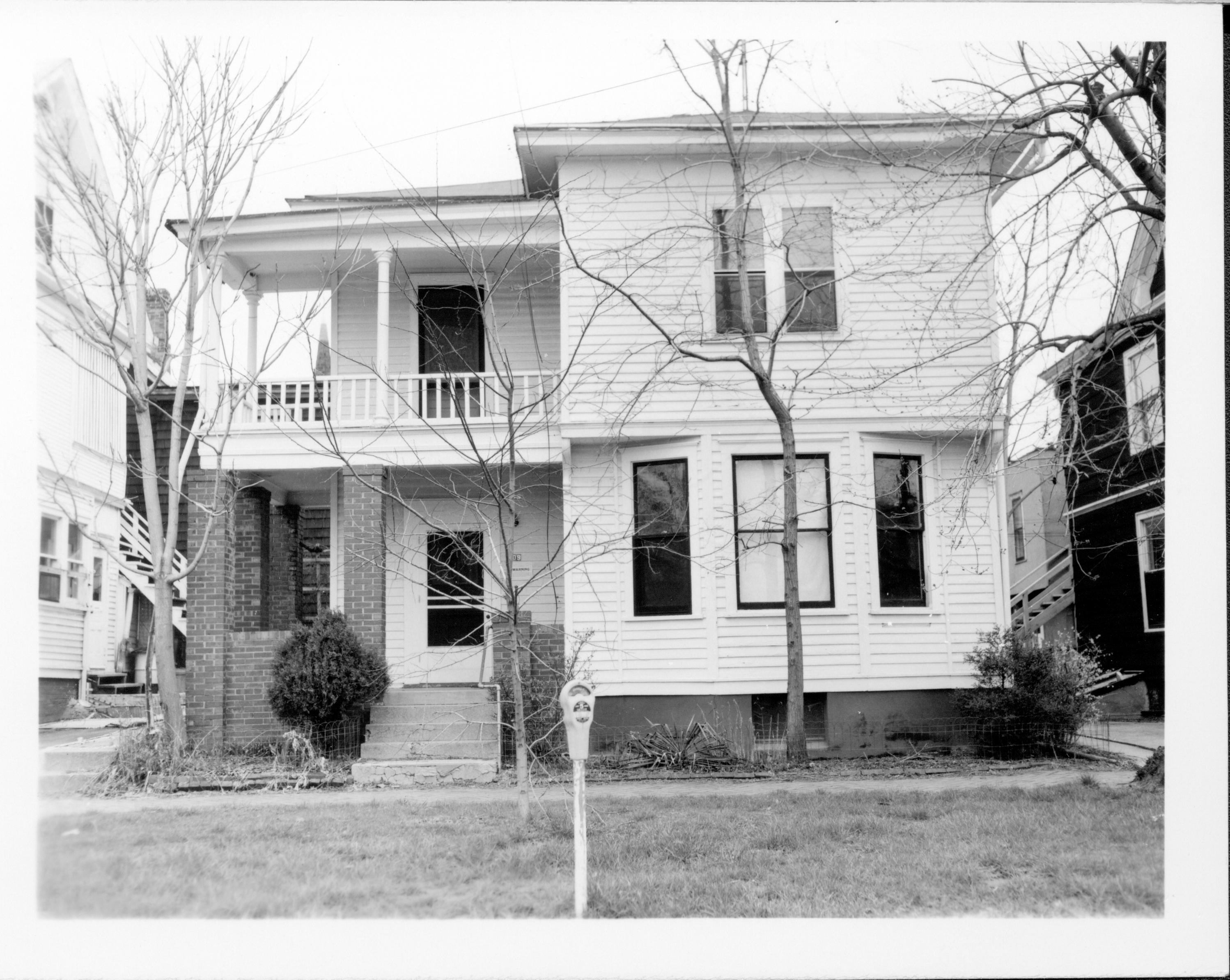Duplex apartment owned by William Sheeham, Block 7, Lot 8 along Jackson Street.  Area is Visitor Center now.  William Hermes owned houses on either side. Looking North from Jackson Street. Sheeham, Hermes, Jackson Street, Visitor Center