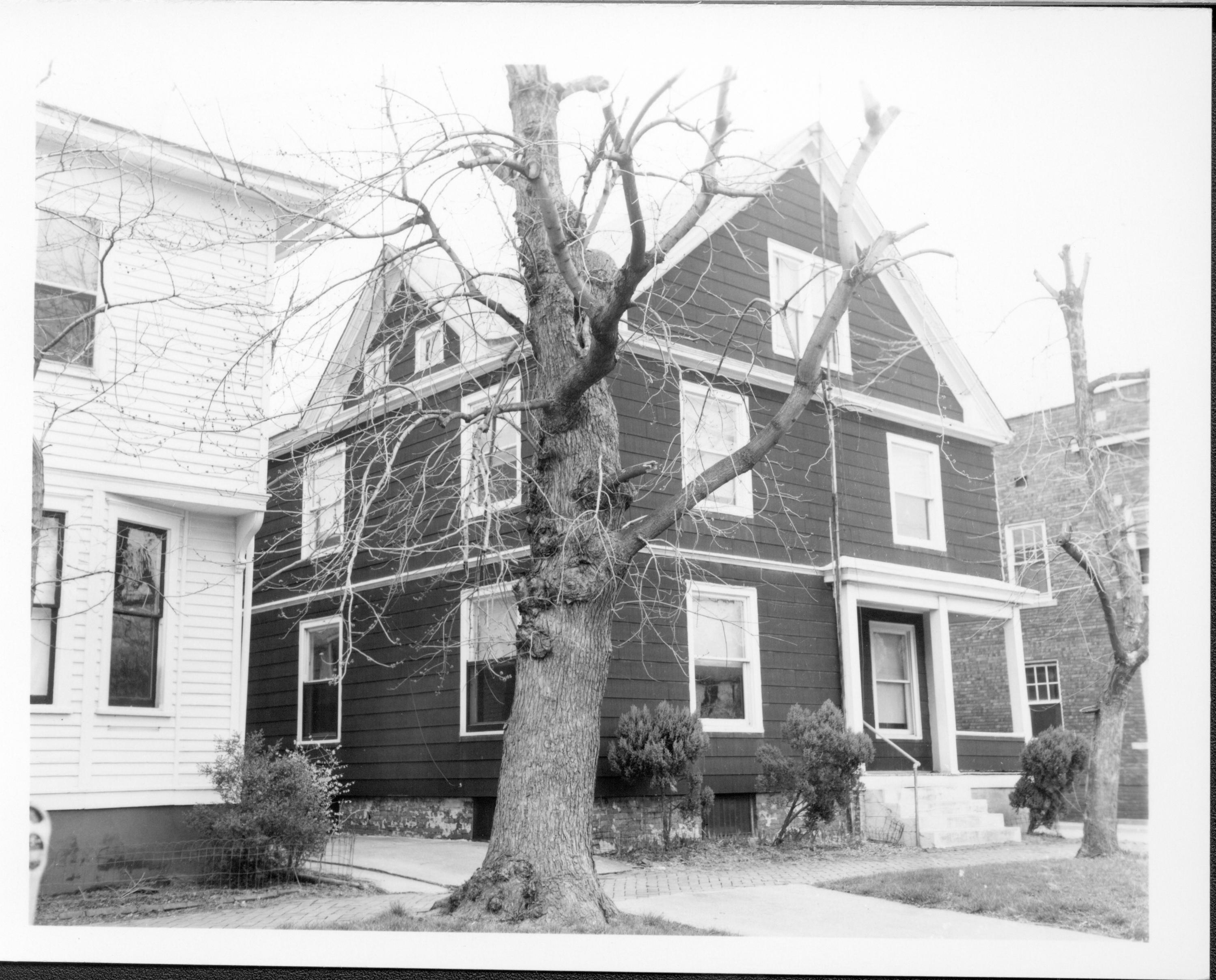 House owned by William Hermes in use as apartments, Block 7, Lot 8 along Jackson Street.  House on left owned by William Sheeham.  Brick building on right owned by Herman Hofferkamp.  Area is now Visitor Center Looking Northeast from Jackson Street. Hermes, Sheeham, Hofferkamp, Jackson Street, Visitor Center
