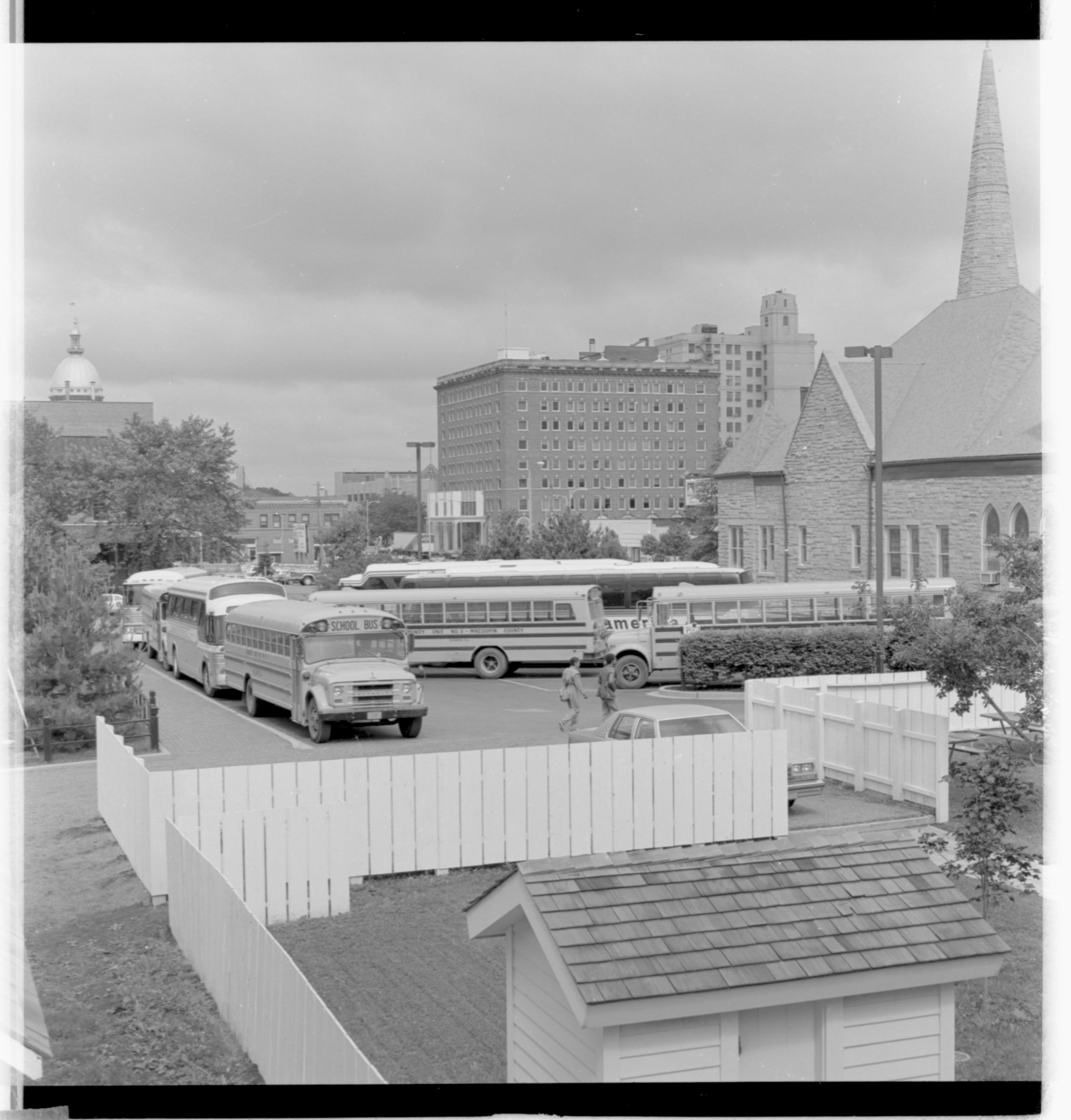 Parking lots - Bus Lot, Grace Lutheran Church on right, Lyon House shed in foreground, former Leland Hotel in background center, Capitol Dome on left looking Northwest Bus, Parking Lot, Grace Lutheran Church, Lyon Shed
