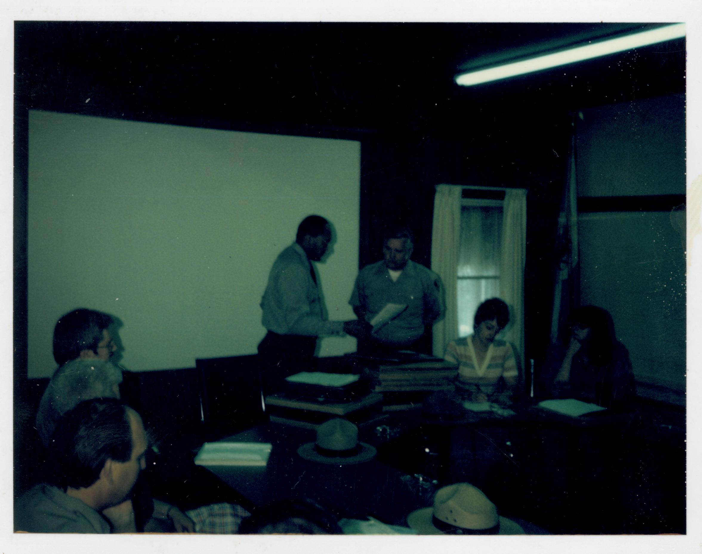 Awards ceremony for staff in Conference Center.  Supt. Gentry Davis gives an award to Maint. Chief Dick Lusardi looking Northwest on second floor awards, staff, Conference Center