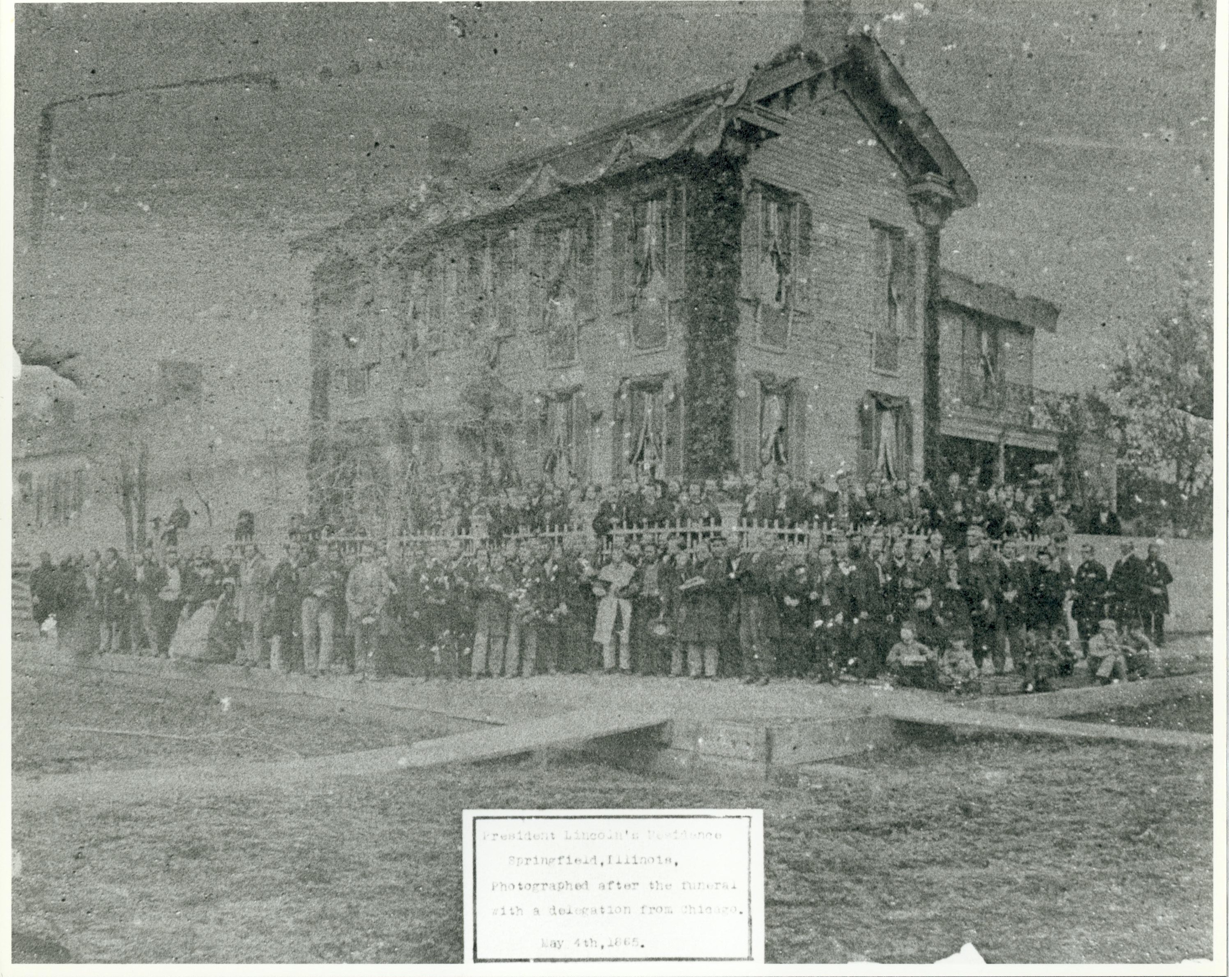 President Lincoln's Residence Springfield, Illinois. Photographed after the funeral with a delegation from Chicago. May 4th, 1865. 