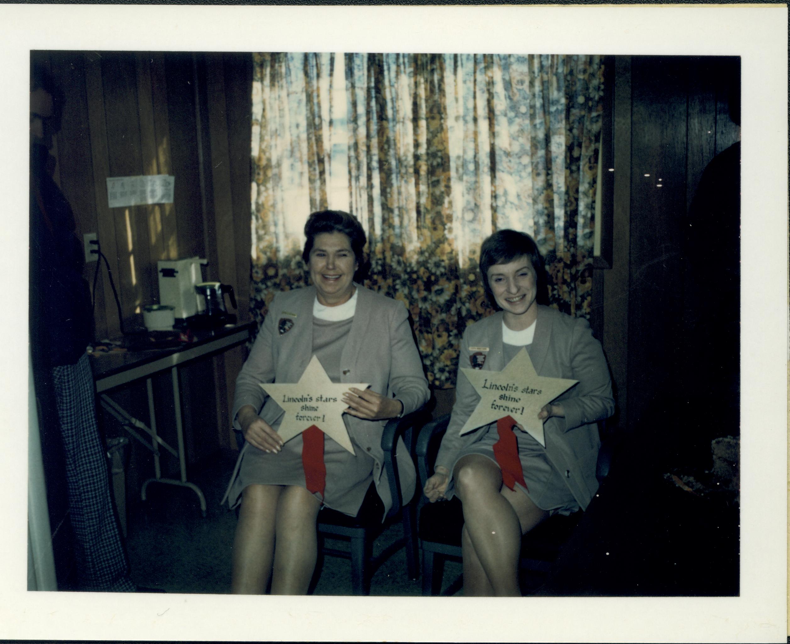 Ruth Ketchum and Judy Winkelmann with star awards for being on a television show. Stuve House(?) awards, staff, Stuve
