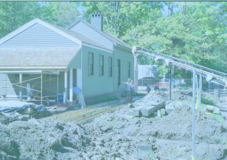 Photo taken facing West. Concrete boardwalk supports being poured at North side of Arnold House LIHO NHS- Roll N2 exp 3 Lincoln Home