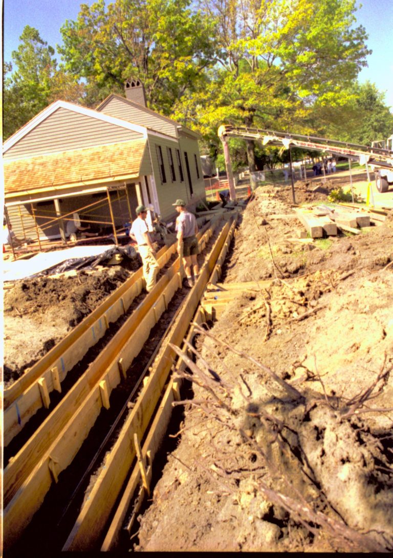 Photo taken facing West. Concrete boardwalk supports being poured at North side of Arnold House LIHO NHS-  Roll N2 exp 4 Lincoln Home