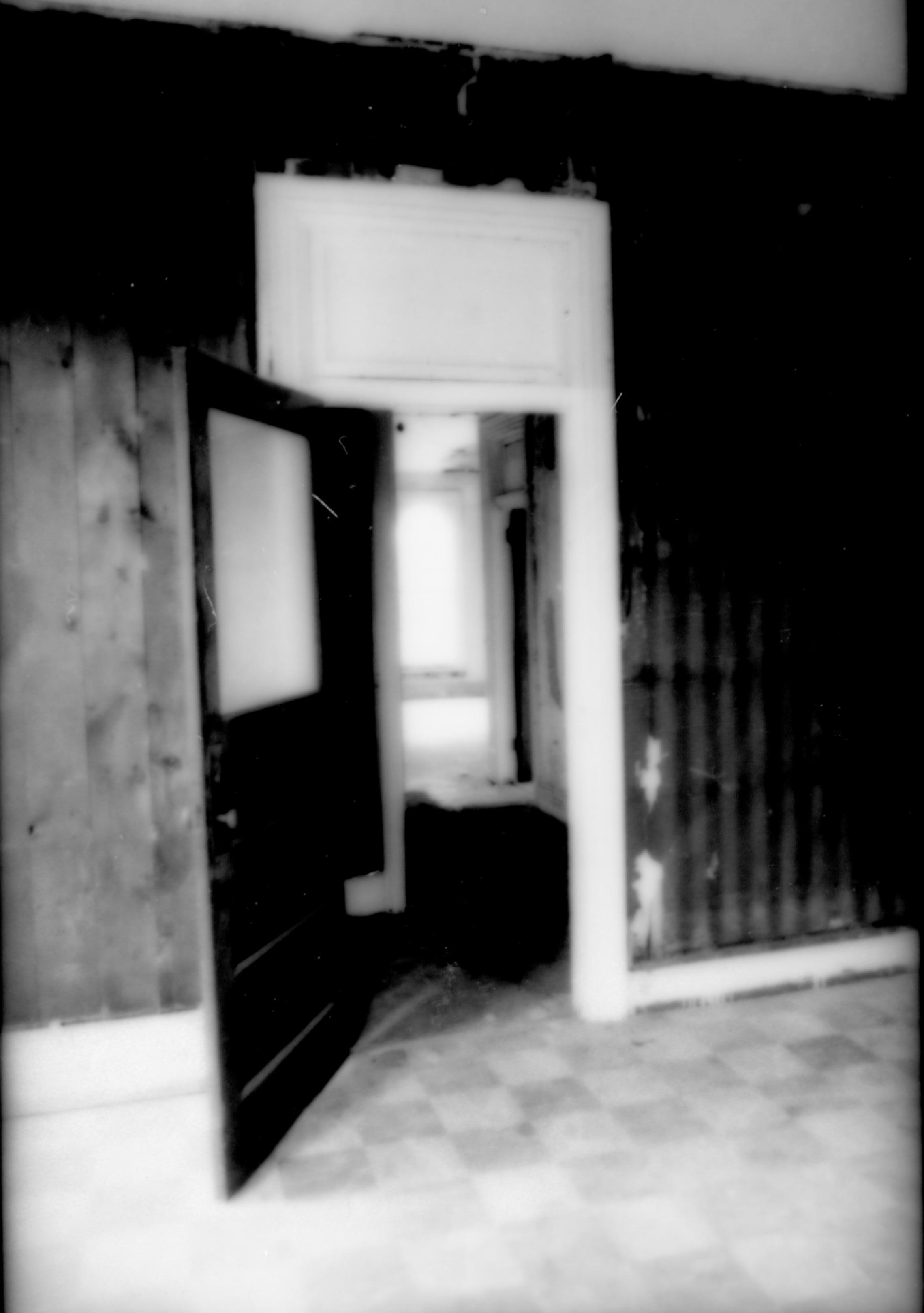 Purpose: Document existing conditions before major removals begin; Stuve House, second floor, Room 205, west wall, looking through door to Room 211 Lincoln Home NHS- Stuve House HS-05-006, exp 11 Stuve House, removals