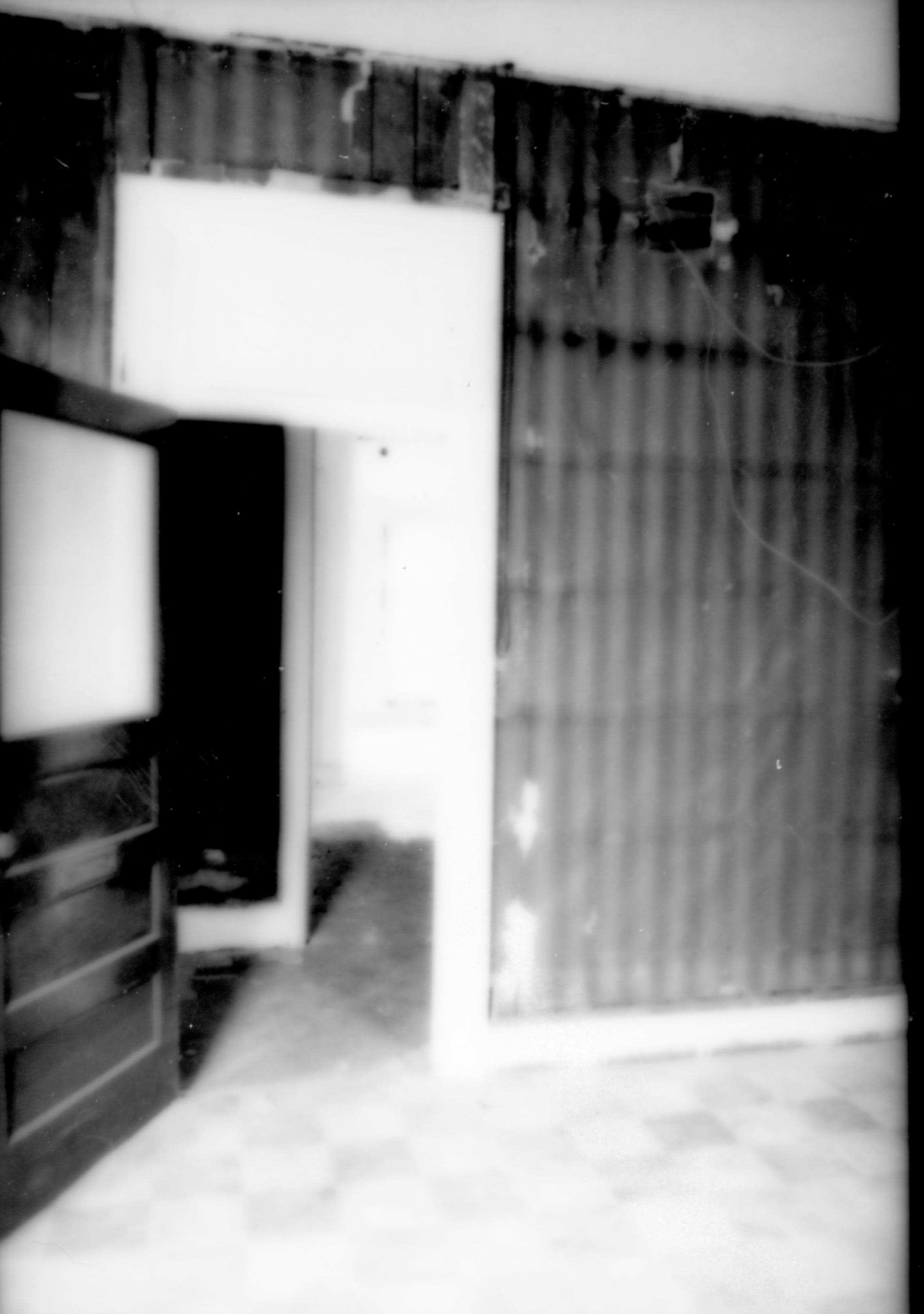 Purpose: Document existing conditions before major removals begin; Stuve House, second floor, Room 205, west wall, looking through door to Room 211 Lincoln Home NHS- Stuve House HS-05-006, exp 24 Stuve House, removals
