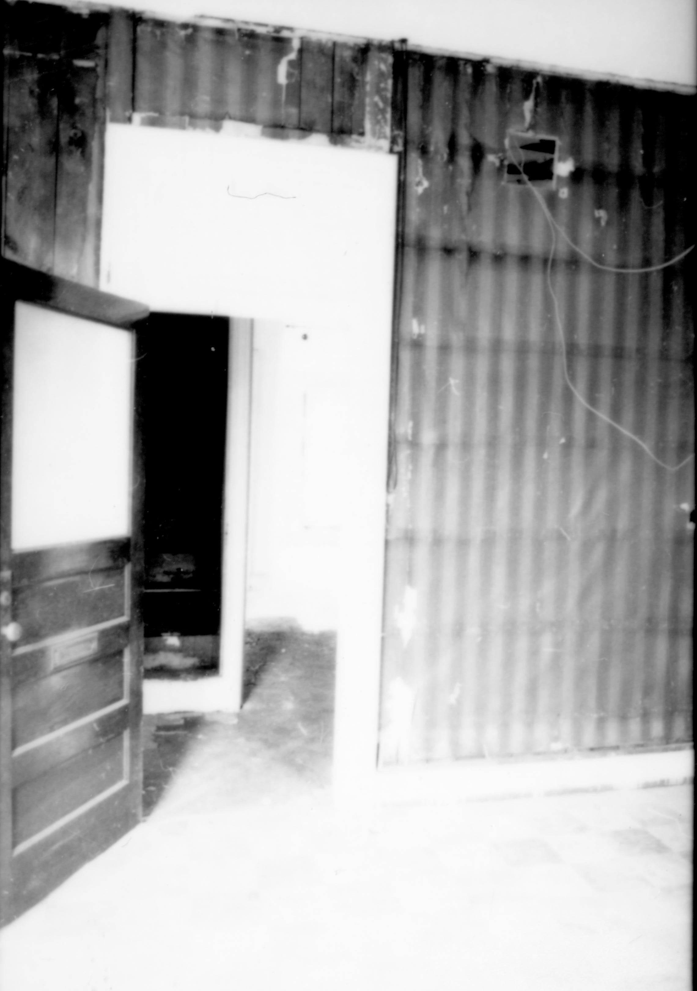 Purpose: Document existing conditions before major removals begin; Stuve House, second floor, Room 205, west wall, looking through door to Room 211 Lincoln Home NHS- Stuve House HS-05-007, exp 1 Stuve House, removals