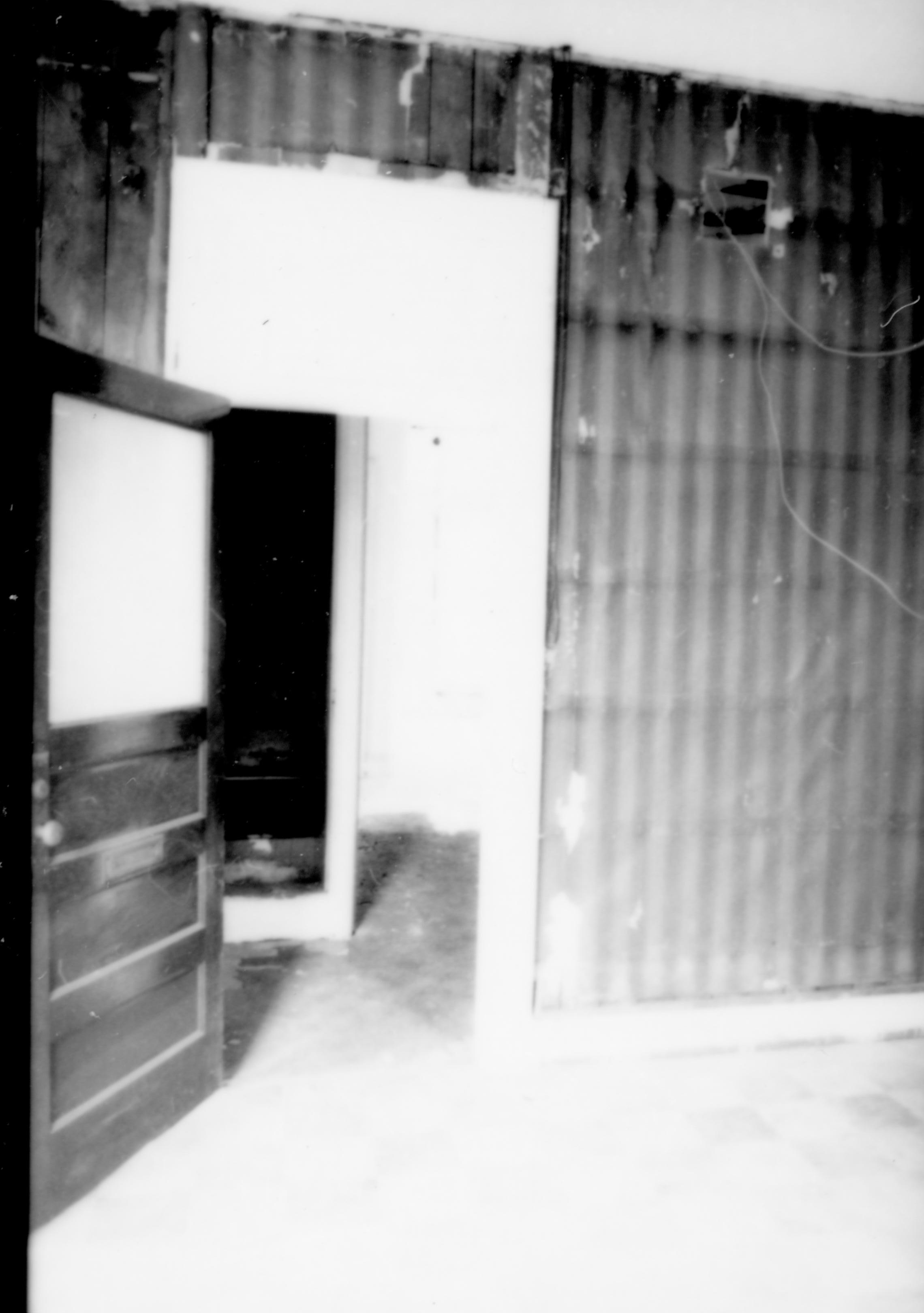 Purpose: Document existing conditions before major removals begin; Stuve House, second floor, Room 205, west wall, looking through door to Room 211 Lincoln Home NHS- Stuve House HS-05-007, exp 2 Stuve House, removals
