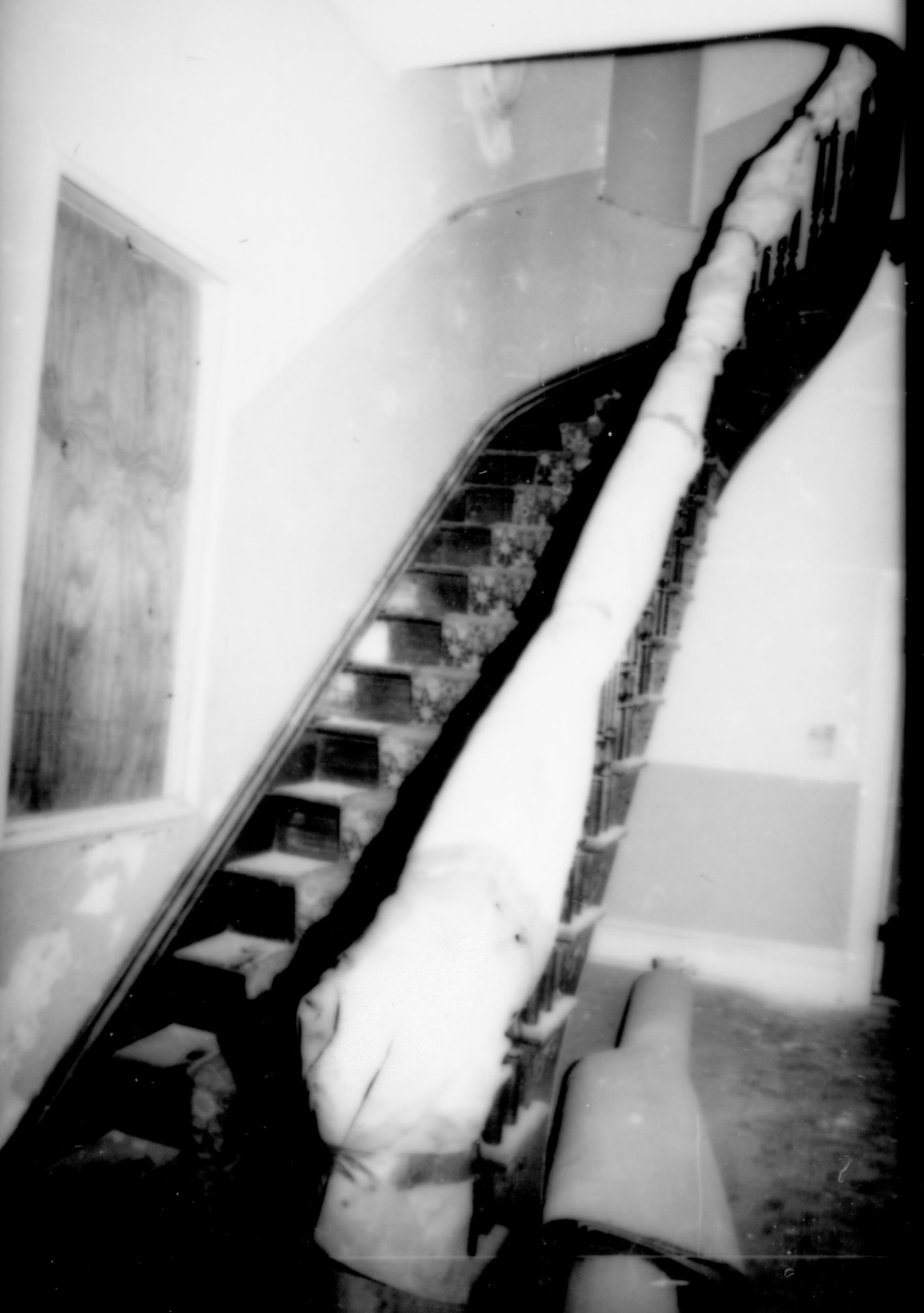 Purpose: Document existing conditions before major removals begin; Stuve House, first floor, Room 100, front stairway to second floor Lincoln Home NHS- Stuve House HS-05-007, exp 5 Stuve House, removals