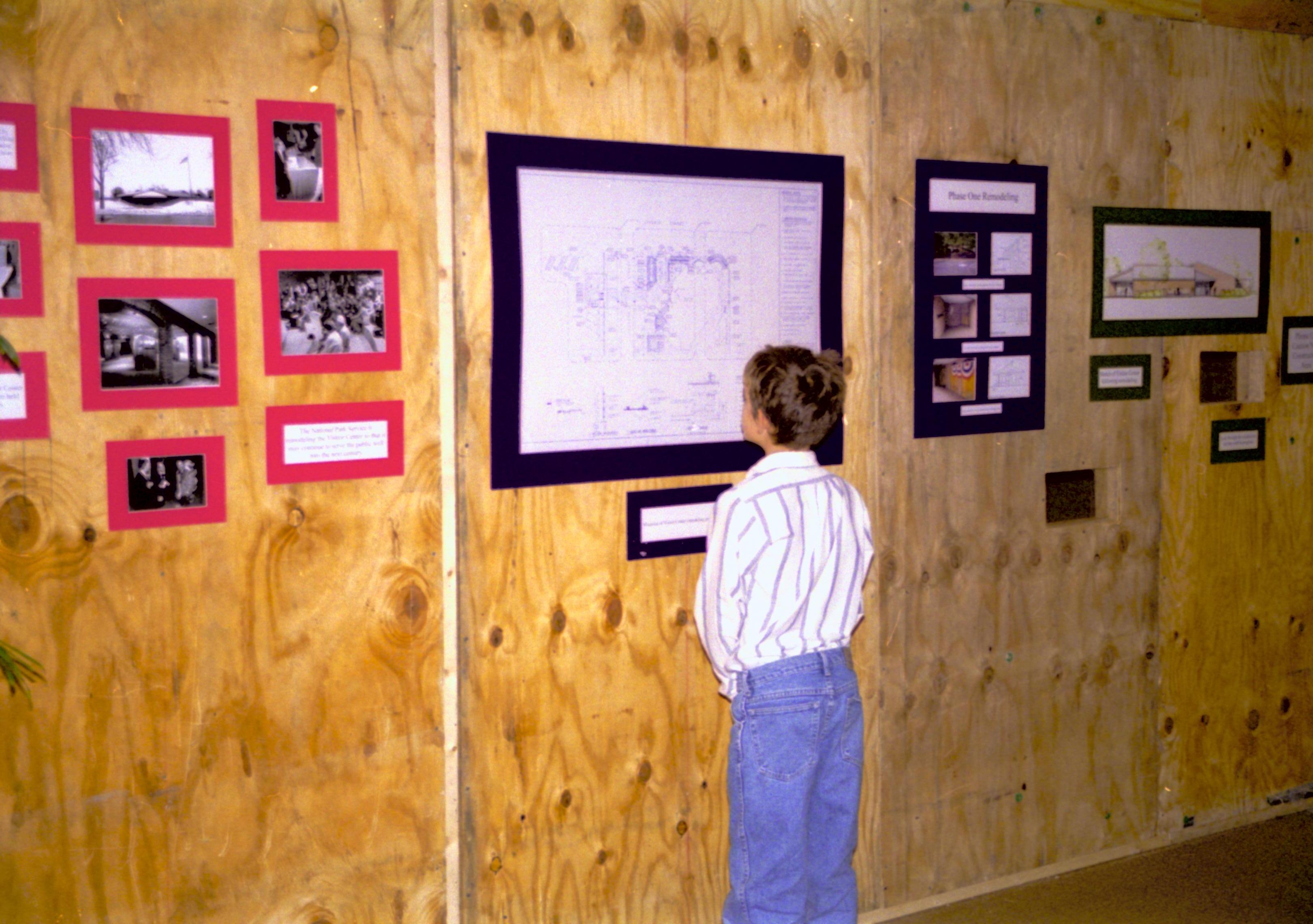 Construction wall and temporary exhibit, and student from Ball-Chatham District Lincoln Home NHS- Visitor Center remodel, exp 15 Visitor Center, remodel