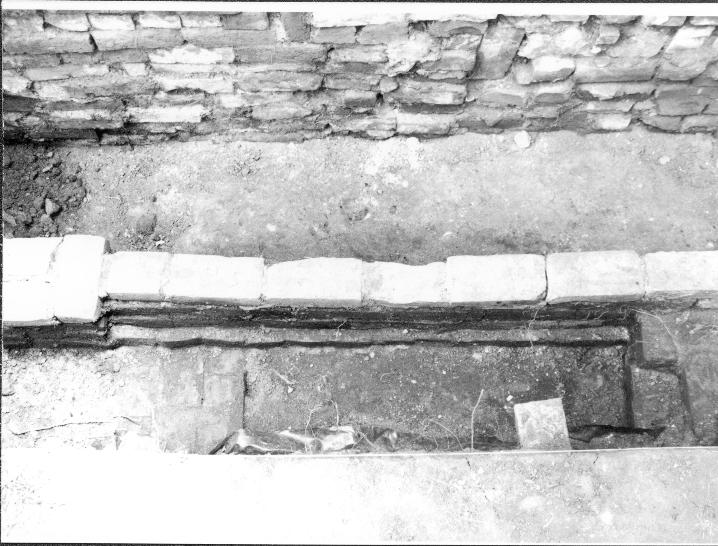 Archeological excavation- hearth beneath rear porch, west Lincoln Home NHS- Sprigg House HS-11, foundation and fence, Roll #4 exp 8 Sprigg House, foundation