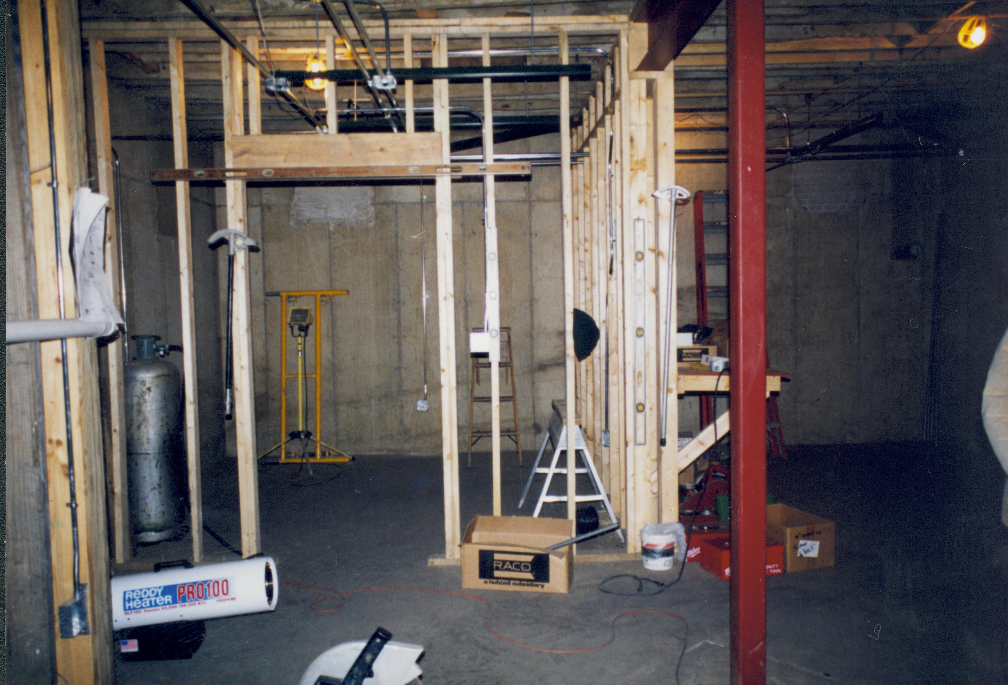 Sprigg House, Standing at bottom of stairs, looking directly at East wall. Sensitive Storage Area (the boom-boom room) under construction Lincoln Home NHS- Sprigg House, Roll N4 exp 30 Sprigg House, restoration, basement