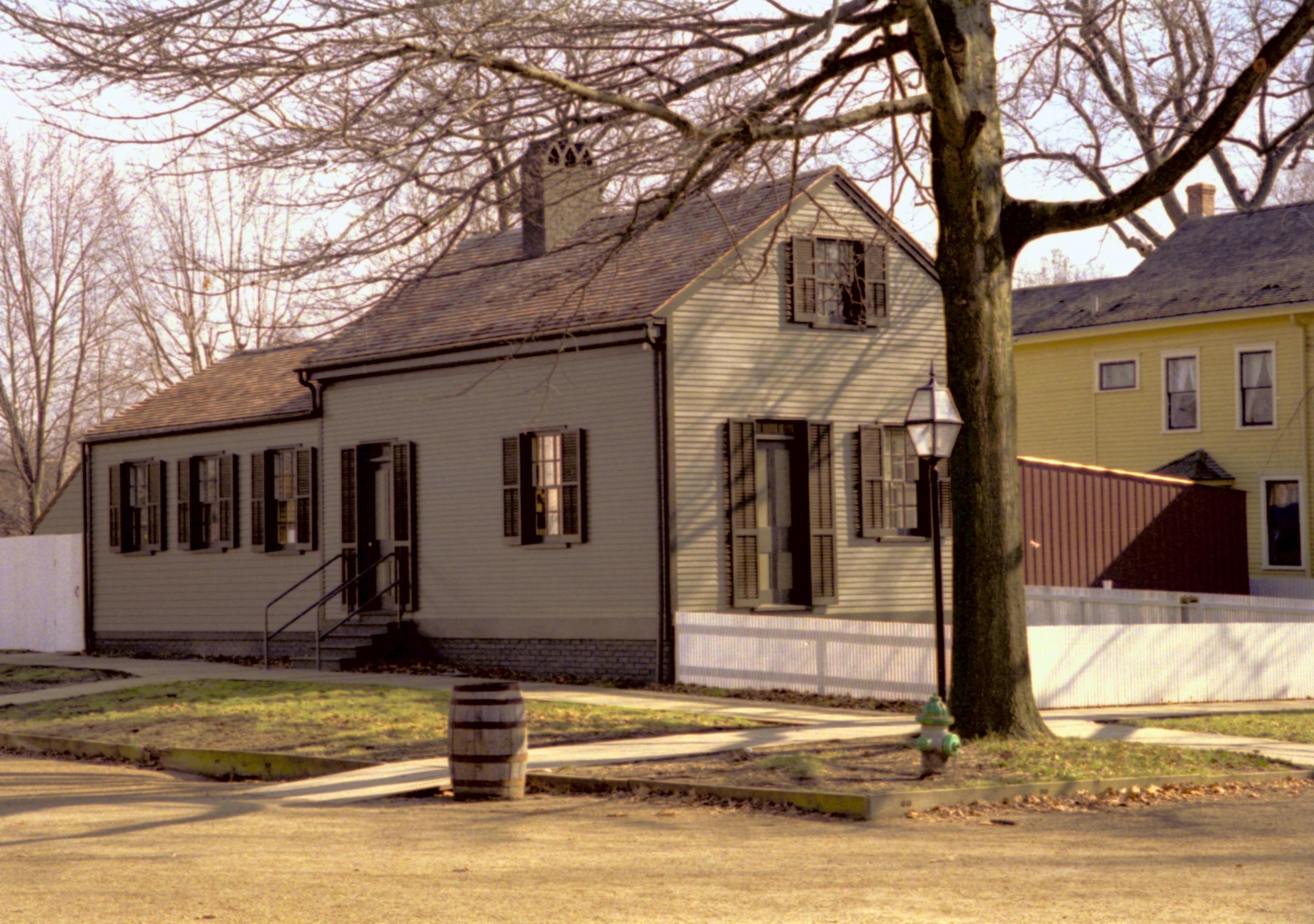 Northwest corner of structure; photo taken from Northwest corner of 8th and Jackson intersection; North wall of Cook House clearly visible Lincoln Home NHS- Sprigg House, Visitor Center, Roll N1 exp 33 Arnold House, restoration