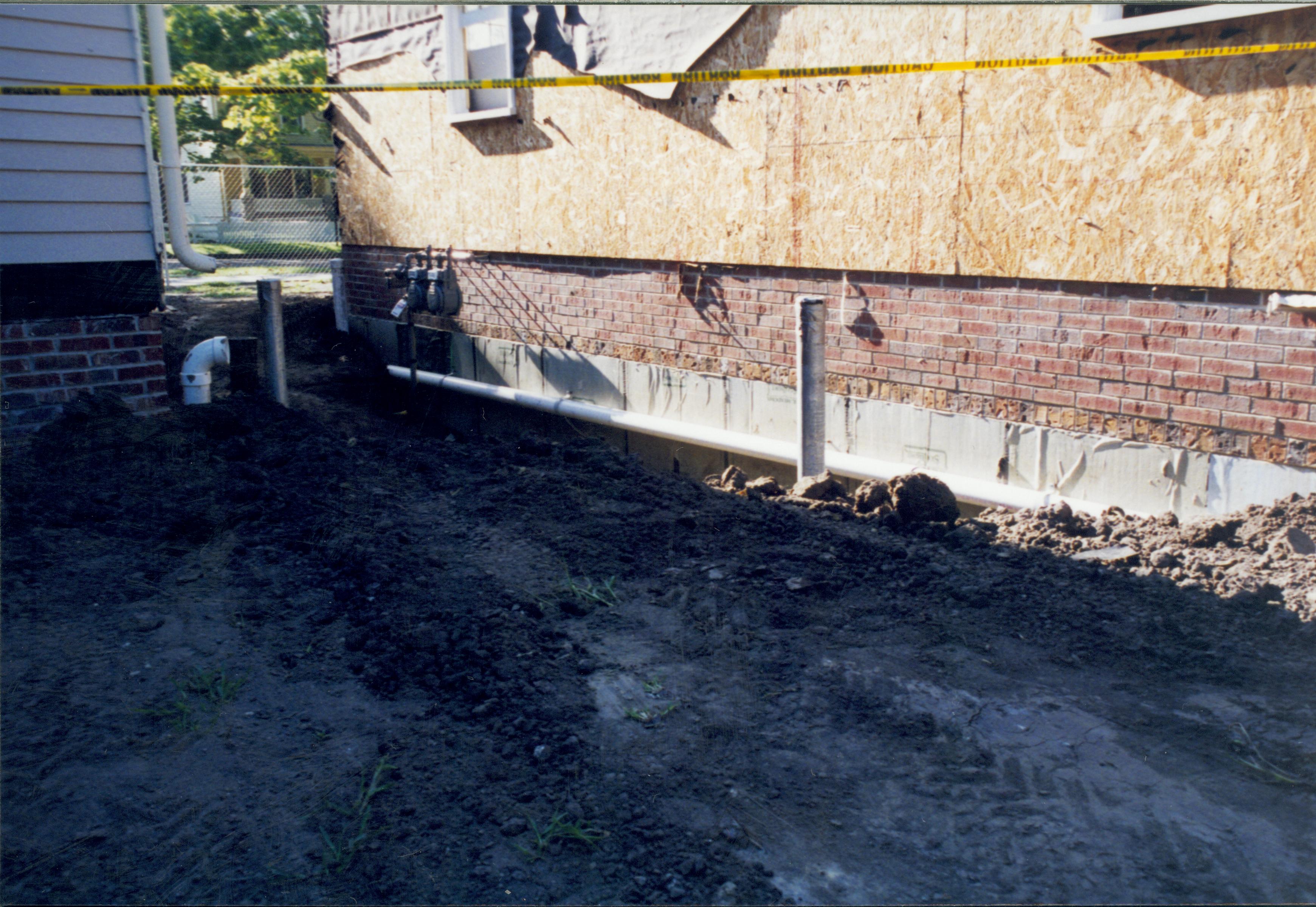 Sprigg House, detail of foundation and plumbing installation Lincoln Home NHS- Sprigg House, Roll N13 exp 35 Sprigg House, restoration, plumbing