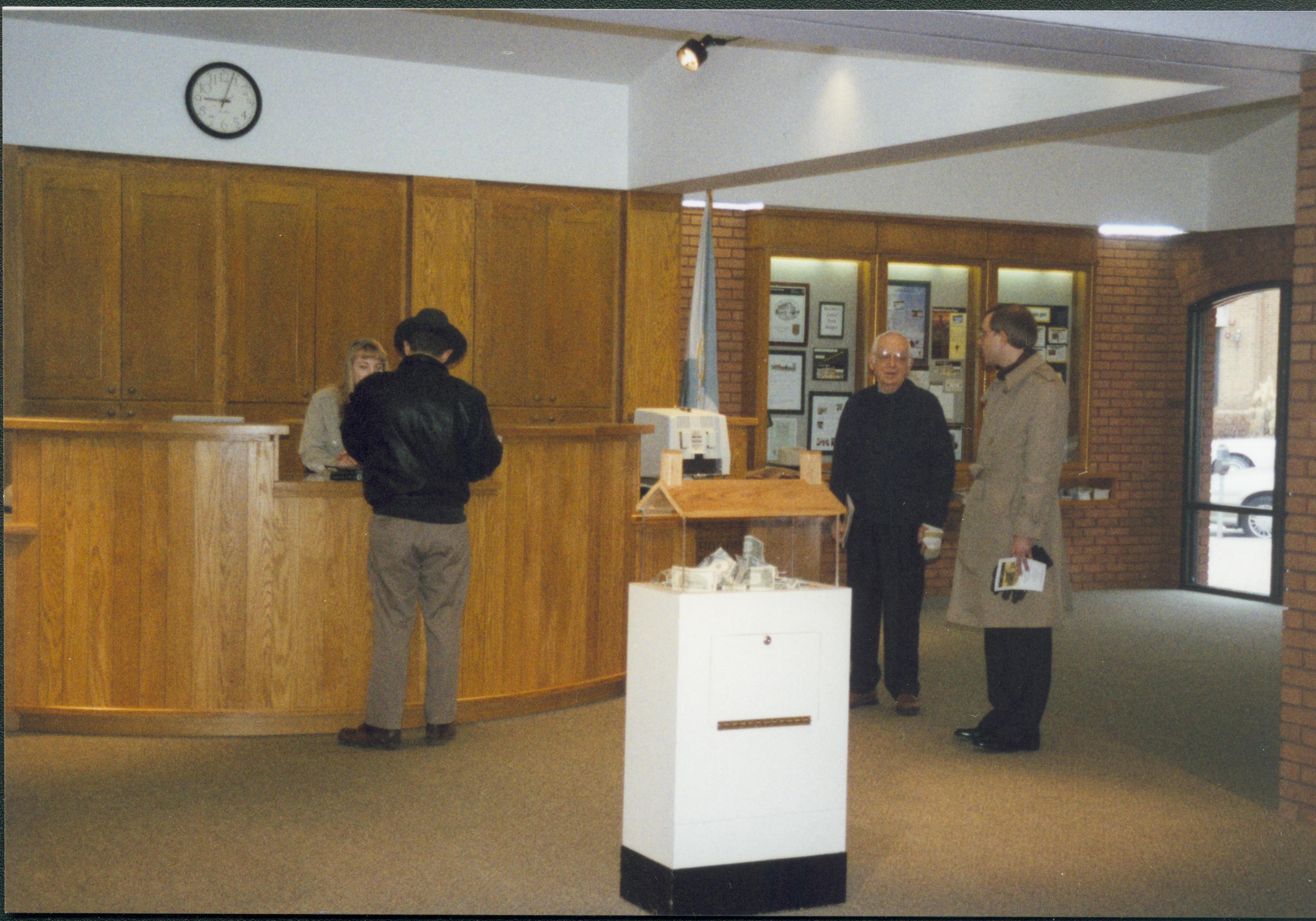 Stephanie at V.C. desk Lincoln Home NHS- Lincoln Birthday, George Painter Lectures, Roll 2001-1 exp 17 reception, lecture