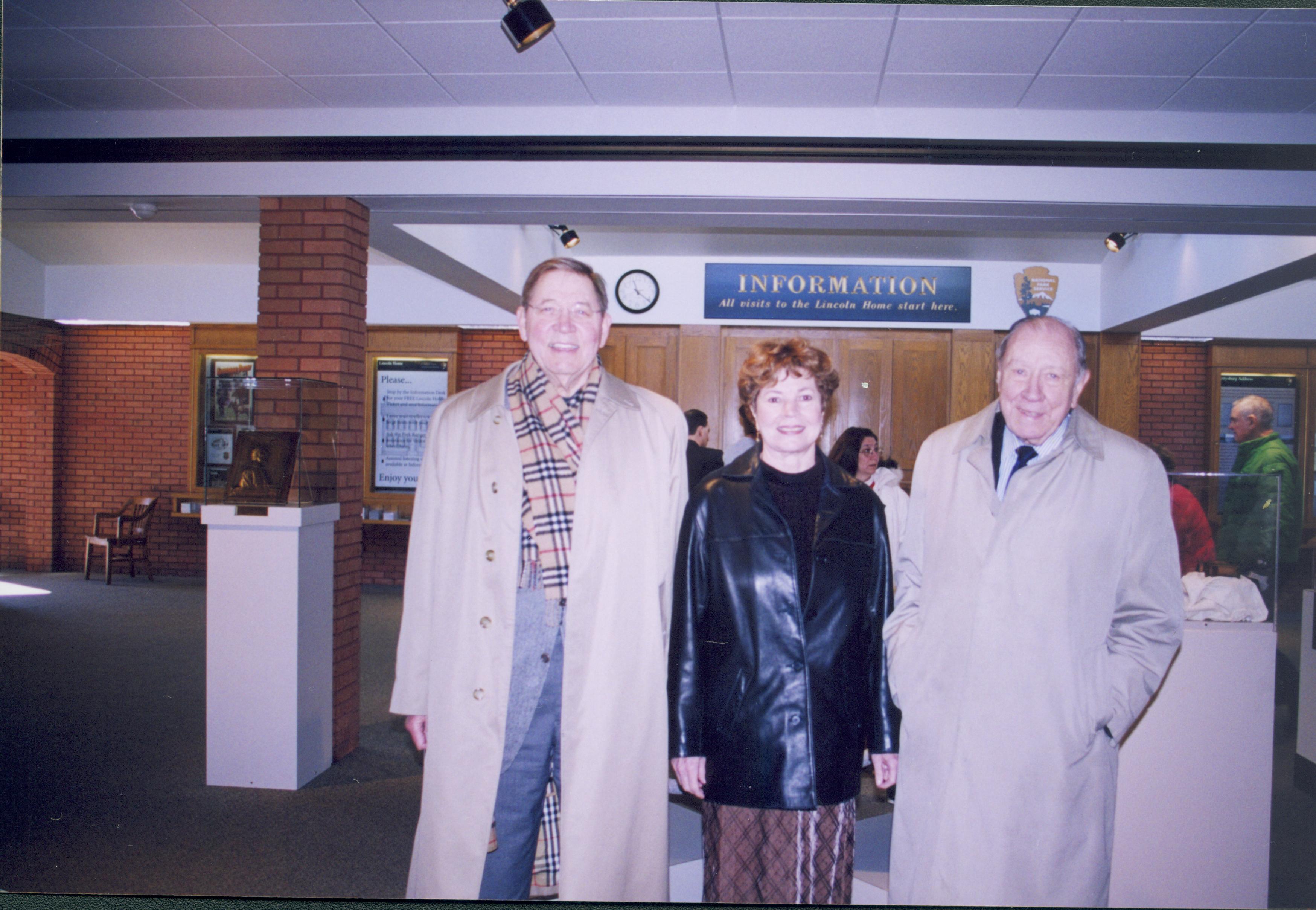 Lilncoln's Birthday - Special guest Admiral William J. Crowe, USN ret. (right), escorted by Admiral and Mrs. Ron Thunman visit during the birthday events in Visitor Center. Visitors visible in background near information desk Looking West from main area Lincoln's Birthday, visitors, VIP visit, Visitor Center