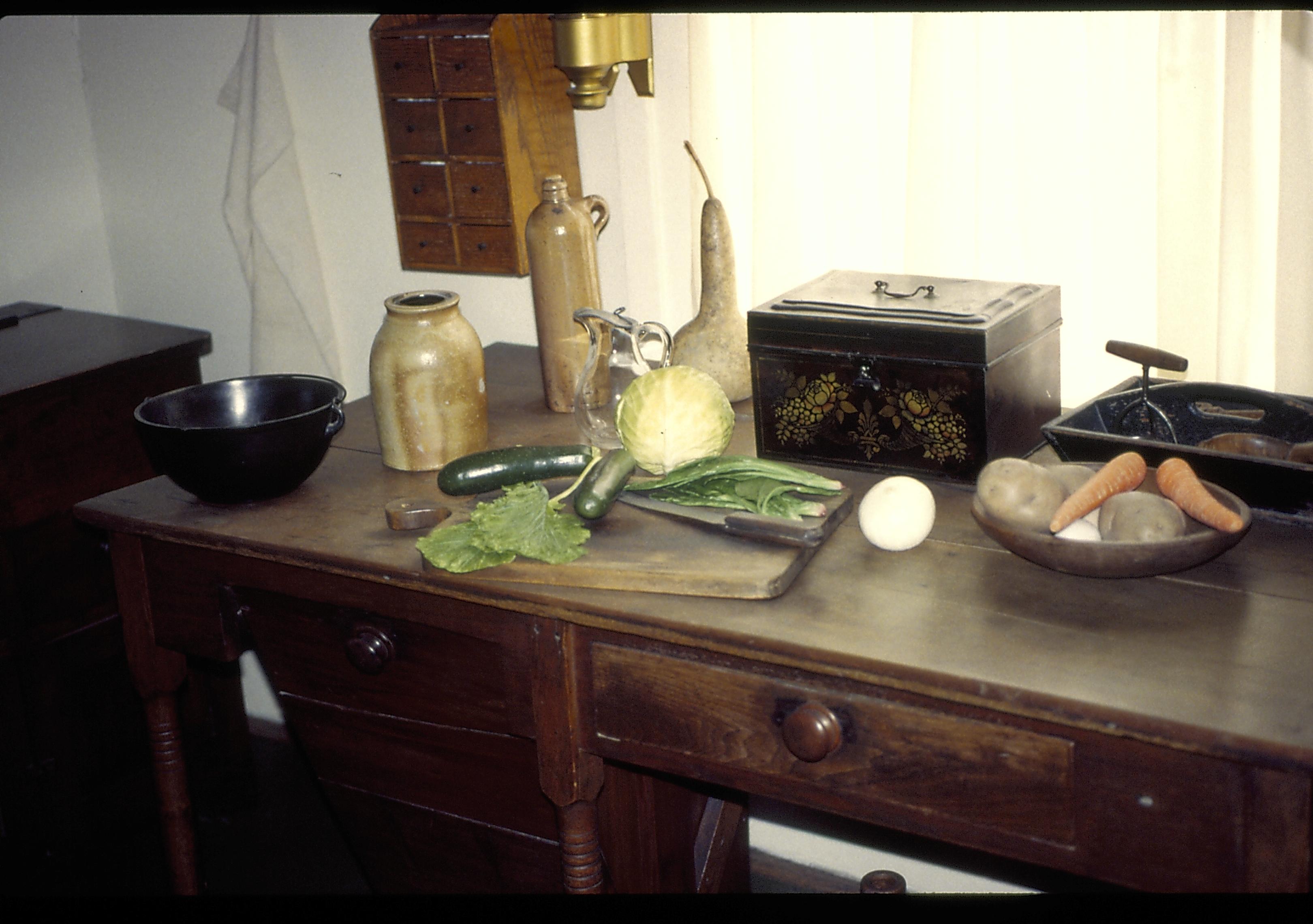 Vegetables on cutting board on table in kitchen. Lincoln Home NHS- Christmas in Lincoln Home 1997, HS-20 Film Roll #17 Christmas, decorations