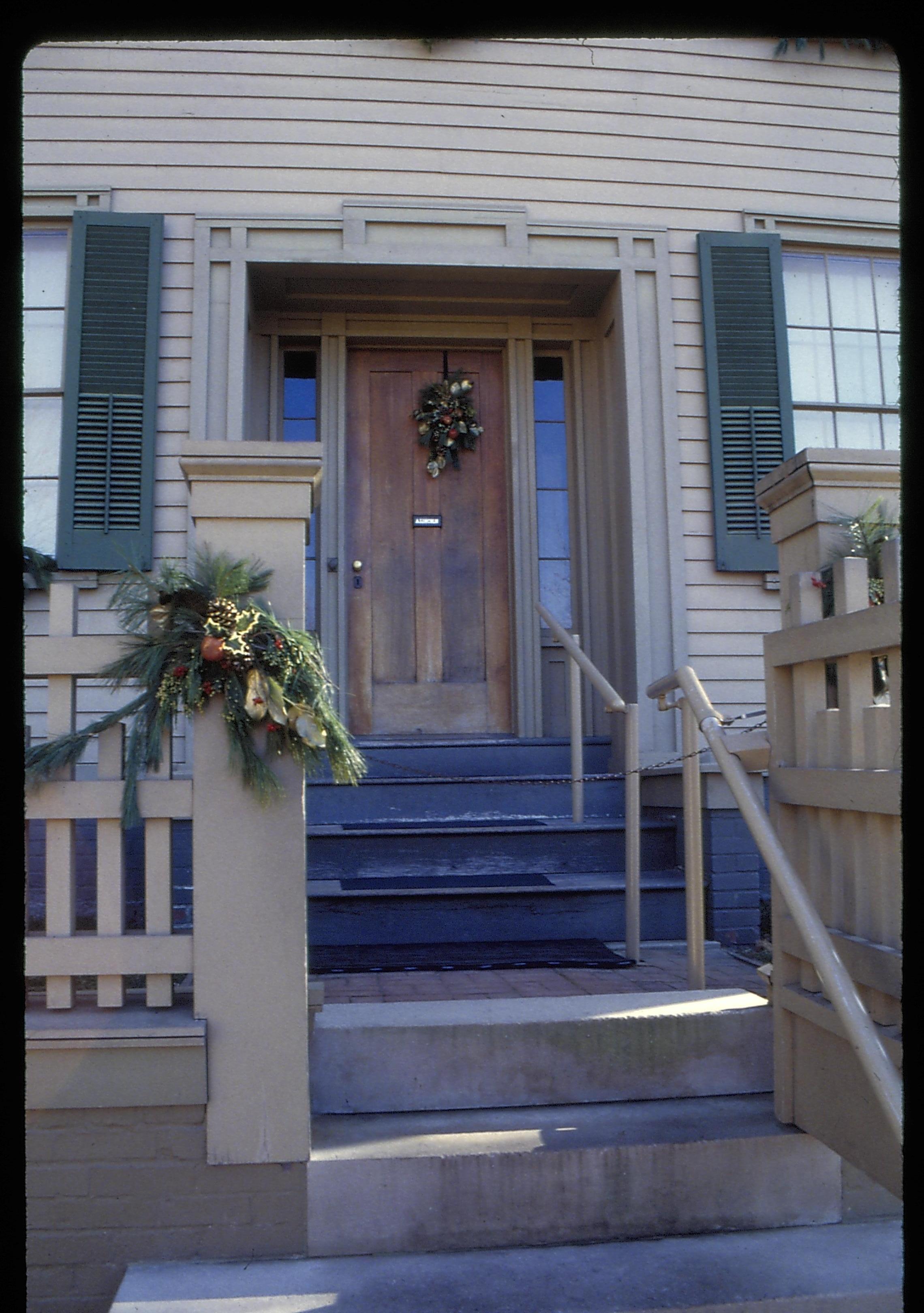 Exterior front door of Lincoln home with Christmas decorations. Lincoln Home NHS- Christmas in Lincoln Home 1997, HS-20 Film Roll #17 Christmas, decorations