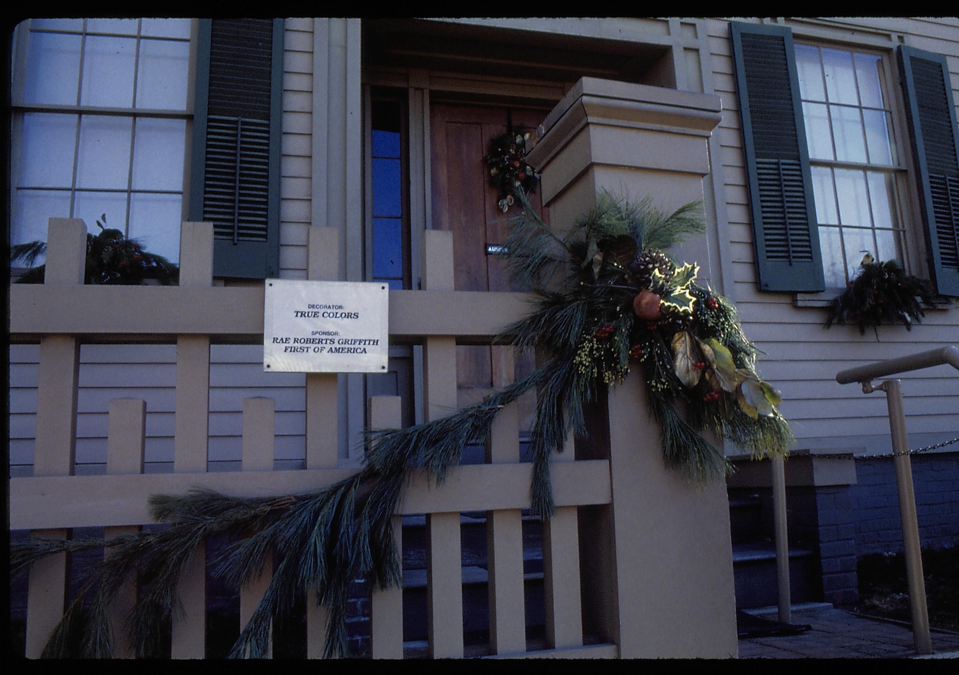 Exterior front post and door of L:incoln home with Christmas decorations. Lincoln Home NHS- Christmas in Lincoln Home 1997, HS-20 Film Roll #17 Christmas, decorations