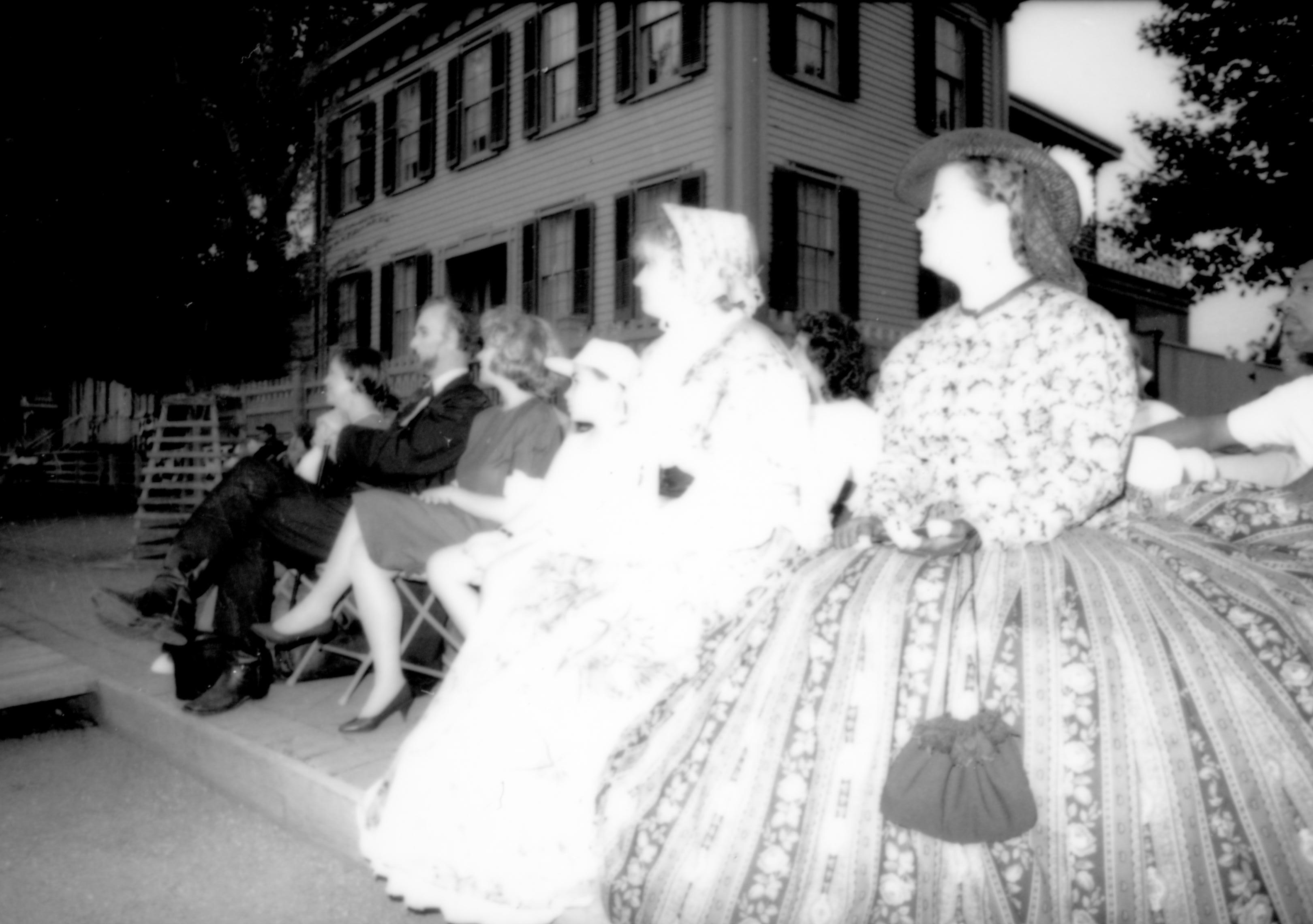 Two ladies in period dress listening to concert. Lincoln Home NHS- Coast Guard Band Concert, 87020 concert, Coast Guard