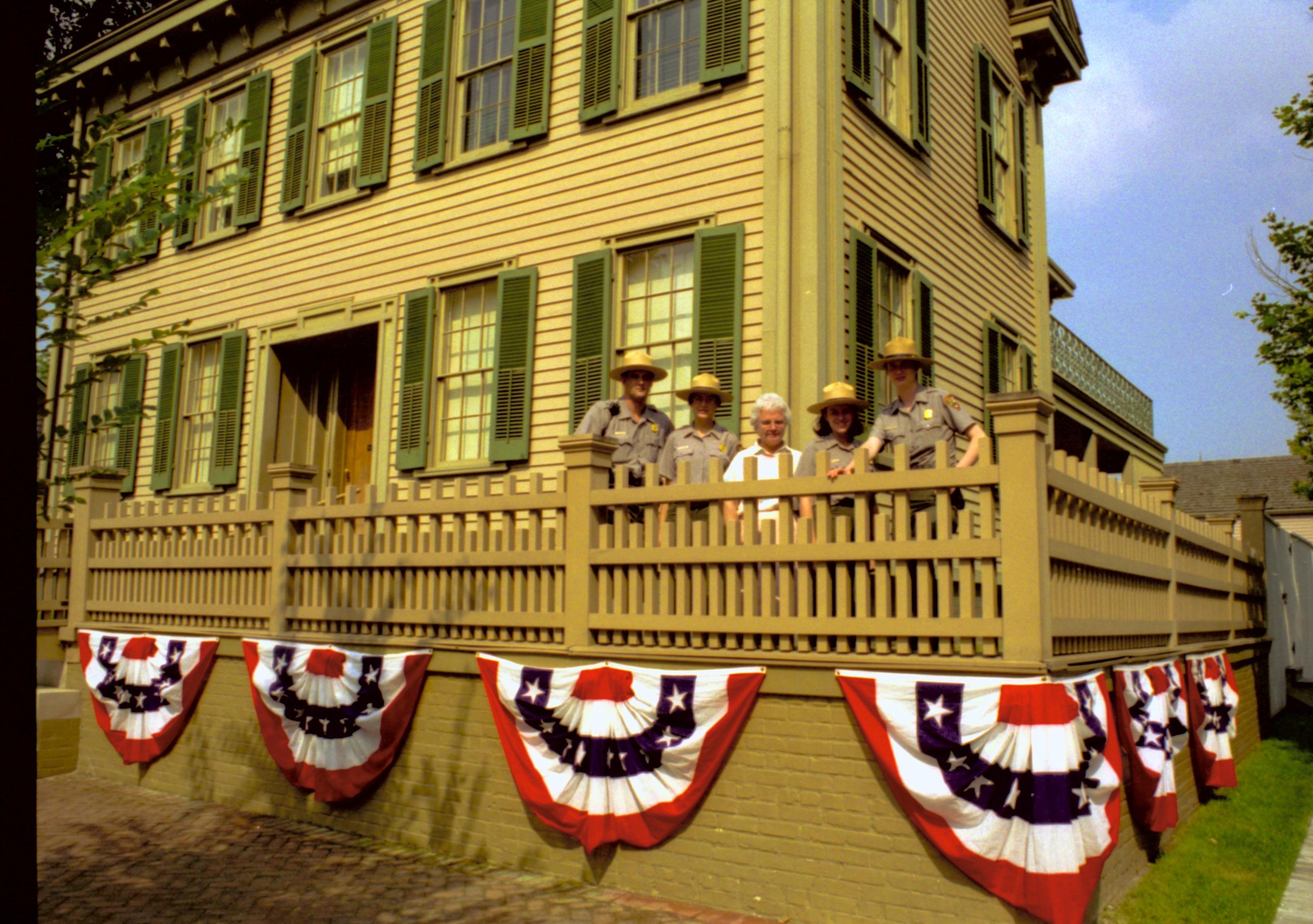 Lincoln Home (west side)with bunting and NPS staff. Lincoln Home NHS- Coast Guard Band Concert, 267618 concert, Coast Guard