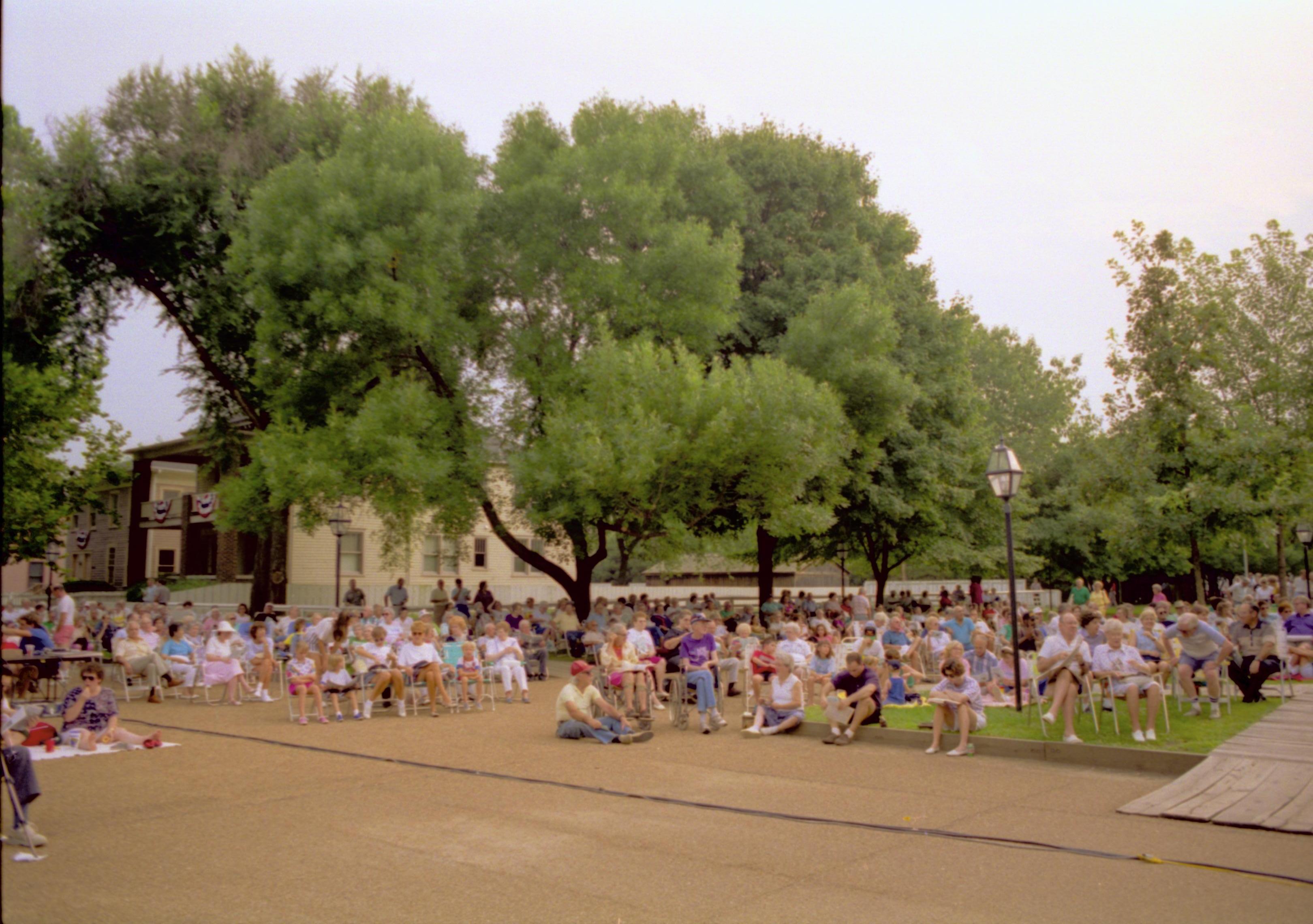 Public seated listening to Coast Guard band. Lincoln Home NHS- Coast Guard Band Concert, 267618 concert, Coast Guard