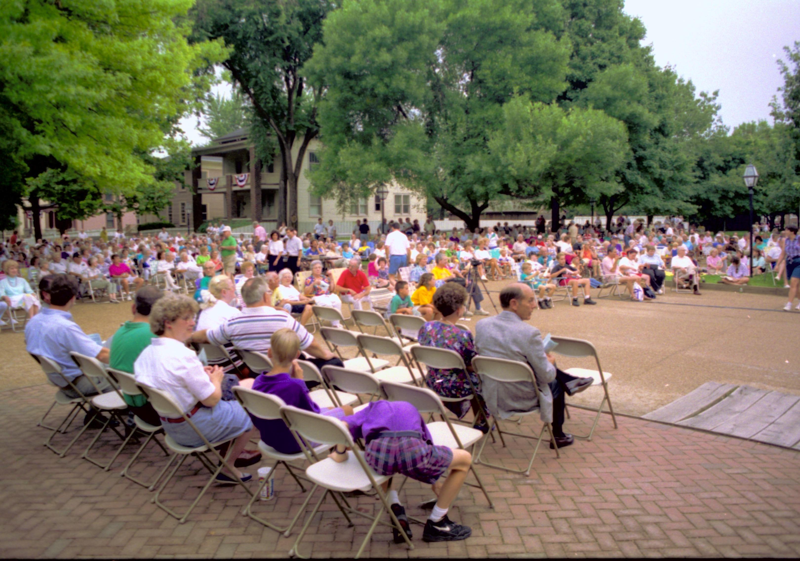 Public seated listening to Coast Guard band. Lincoln Home NHS- Coast Guard Band Concert, 267618 concert, Coast Guard