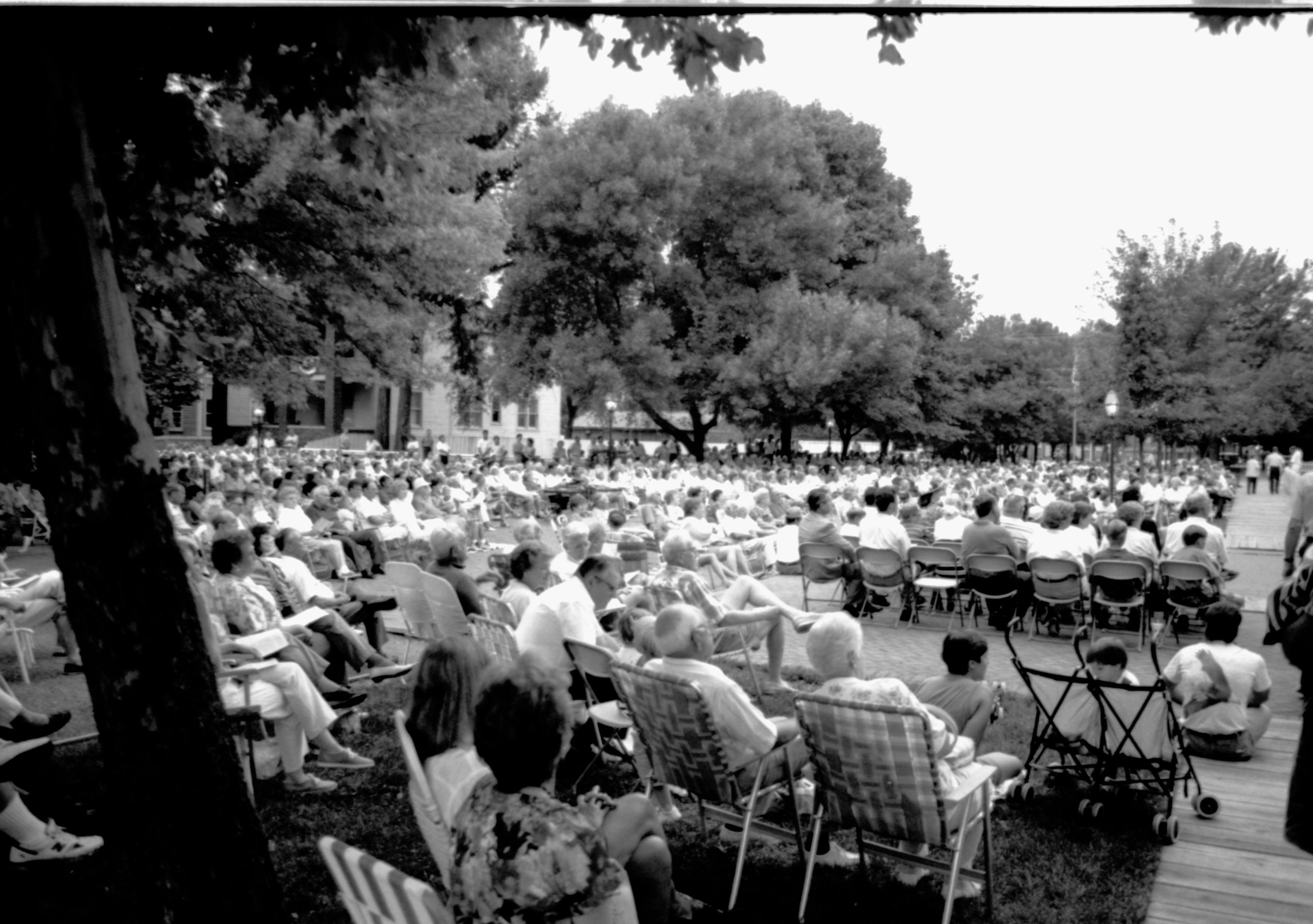 People sitting listening to concert. Lincoln Home NHS- Coast Guard Band Concert concert, Coast Guard