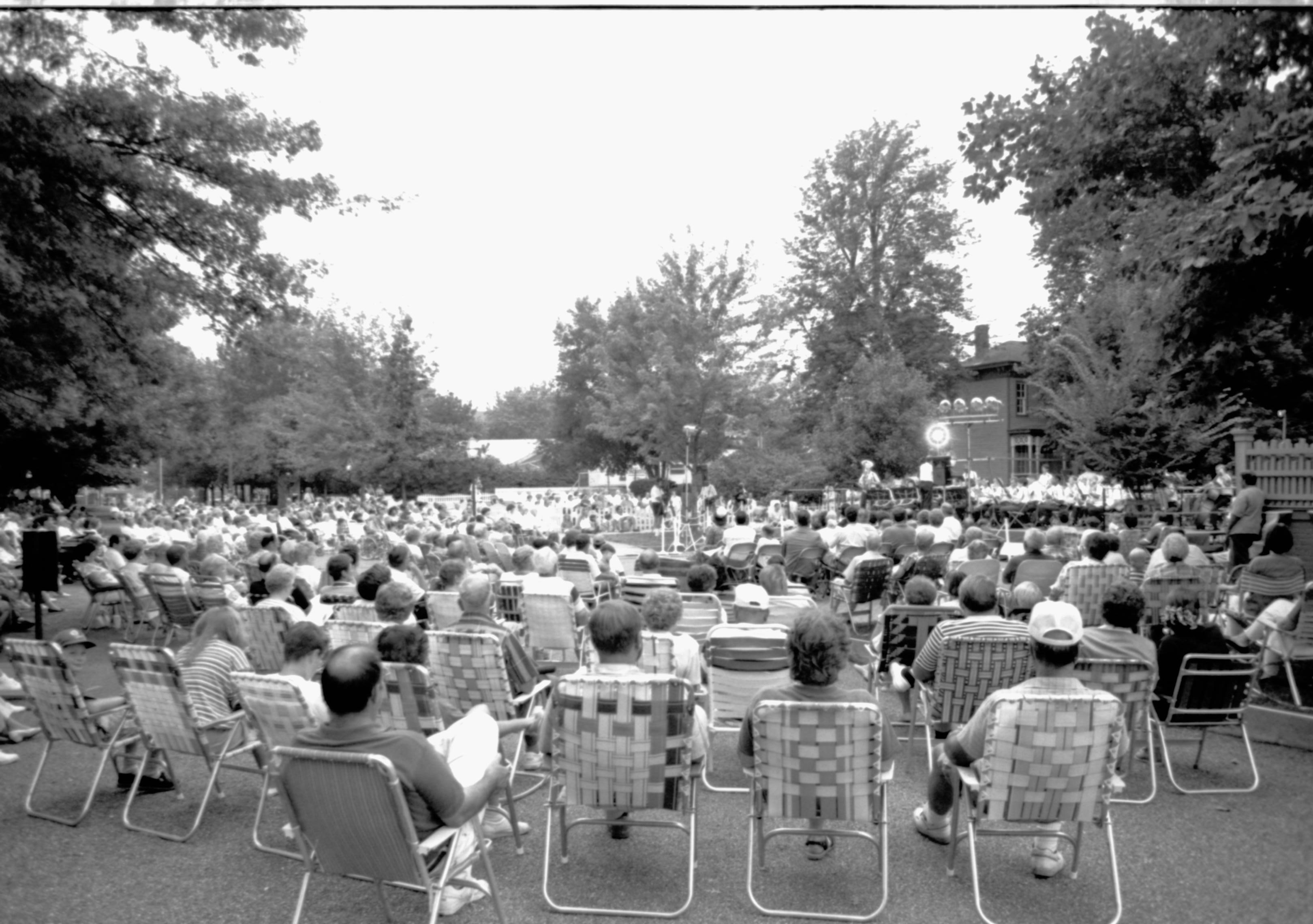 People sitting listening to concert. Lincoln Home NHS- Coast Guard Band Concert concert, Coast Guard