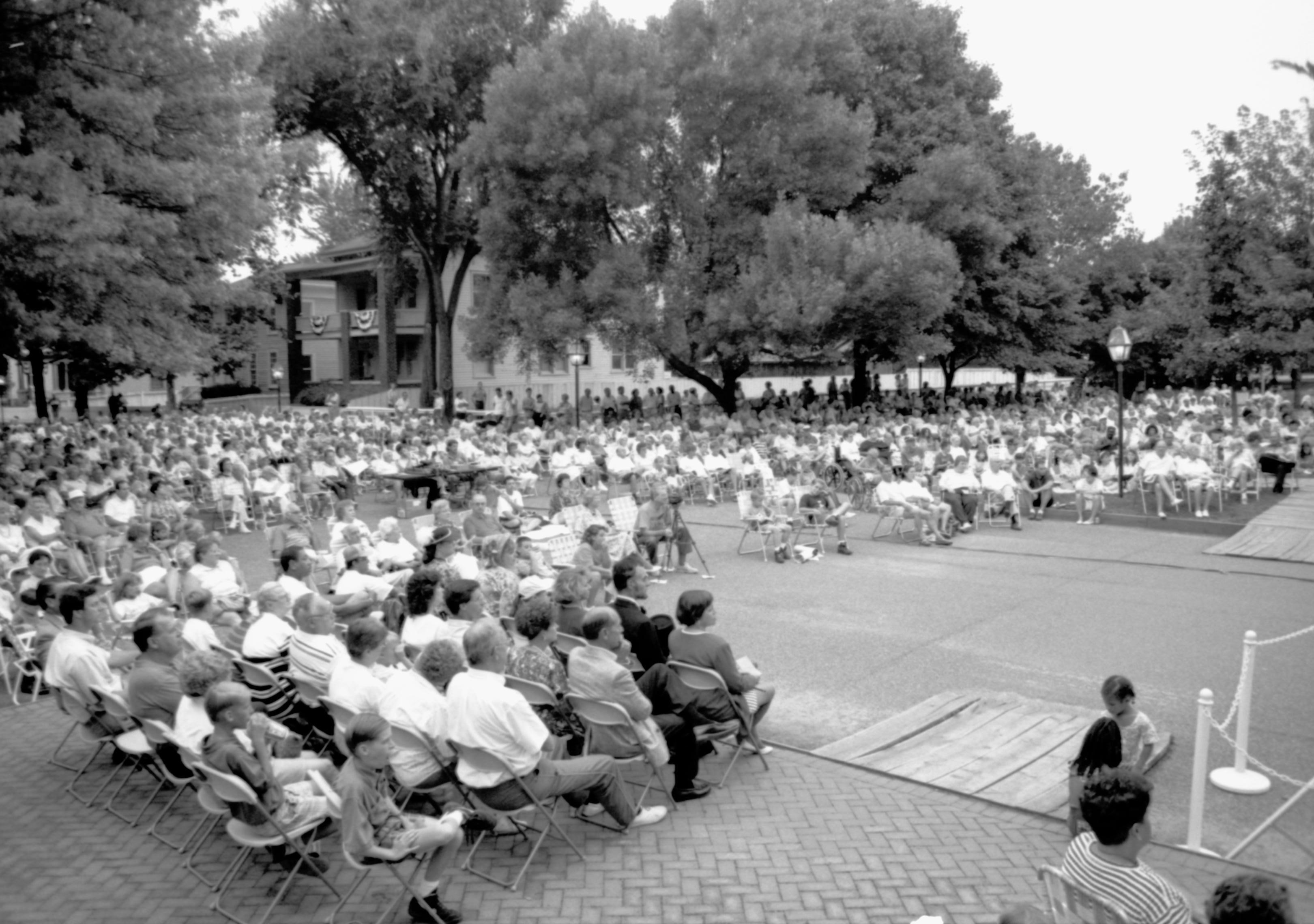 People sitting listening to concert. Lincoln Home NHS- Coast Guard Band Concert concert, Coast Guard