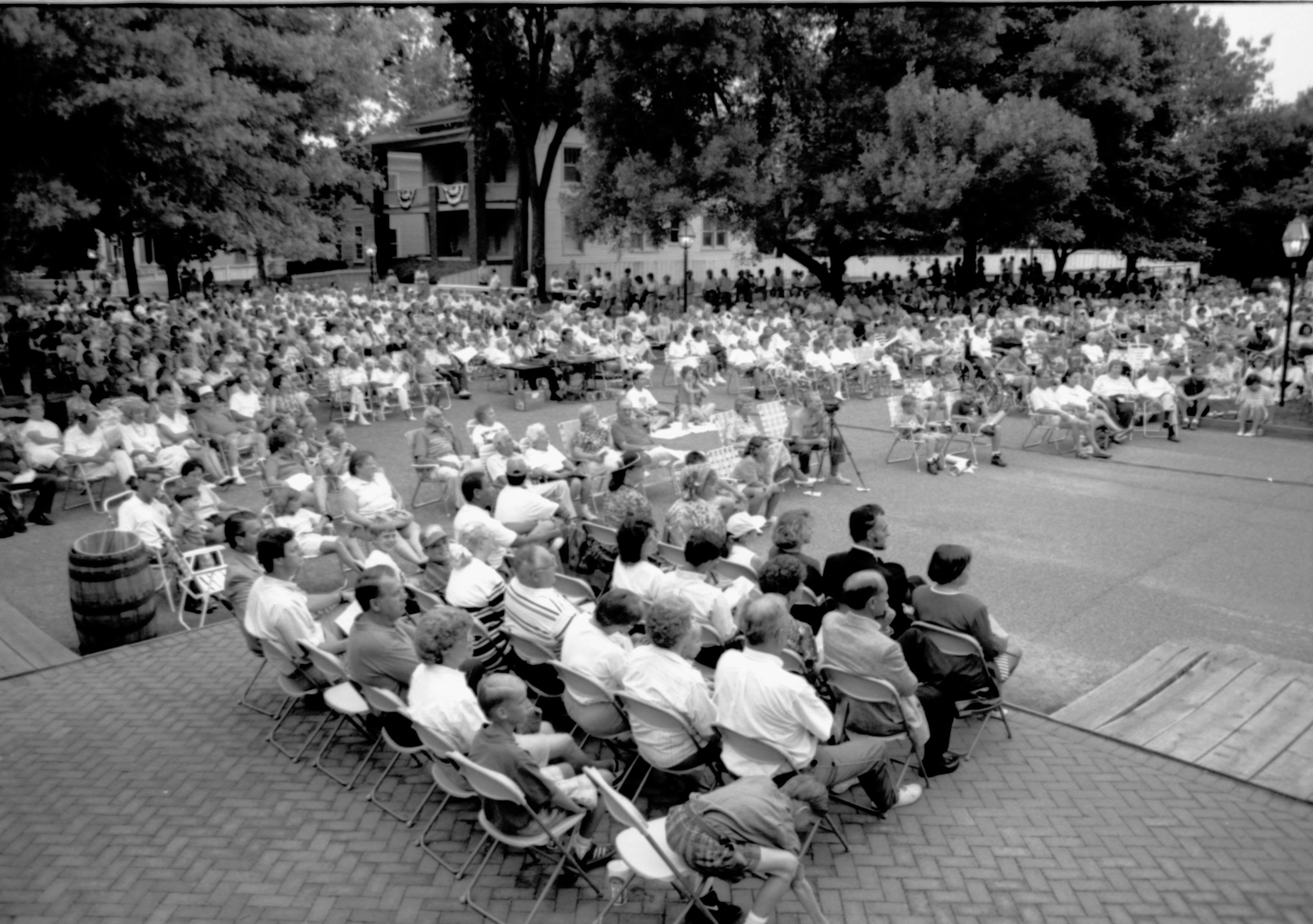 People sitting listening to concert. Lincoln Home NHS- Coast Guard Band Concert concert, Coast Guard