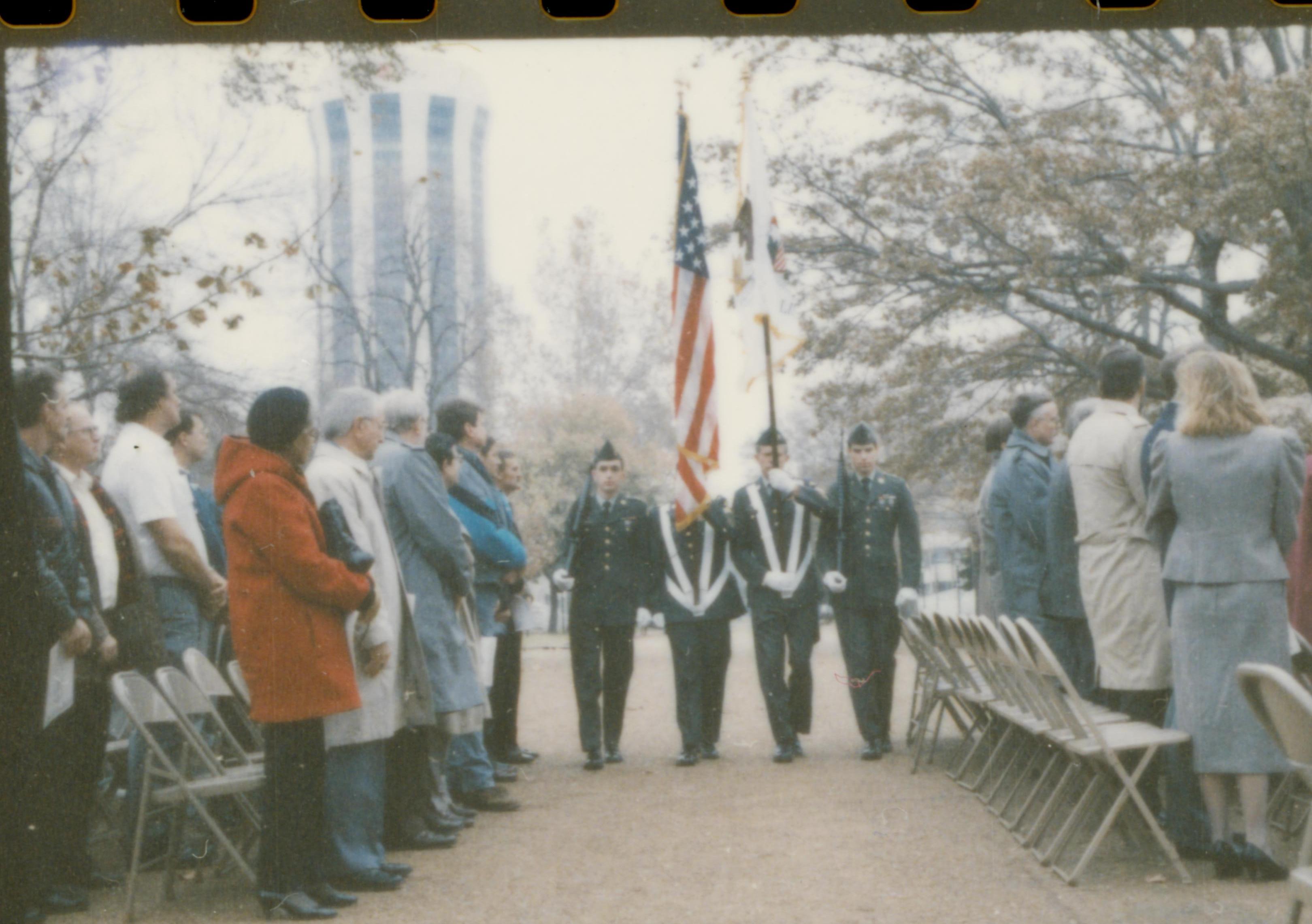 Color guard marching with visitors watching. Lincoln Home NHS- Cook House Re-opening, 1 Cook, ceremony