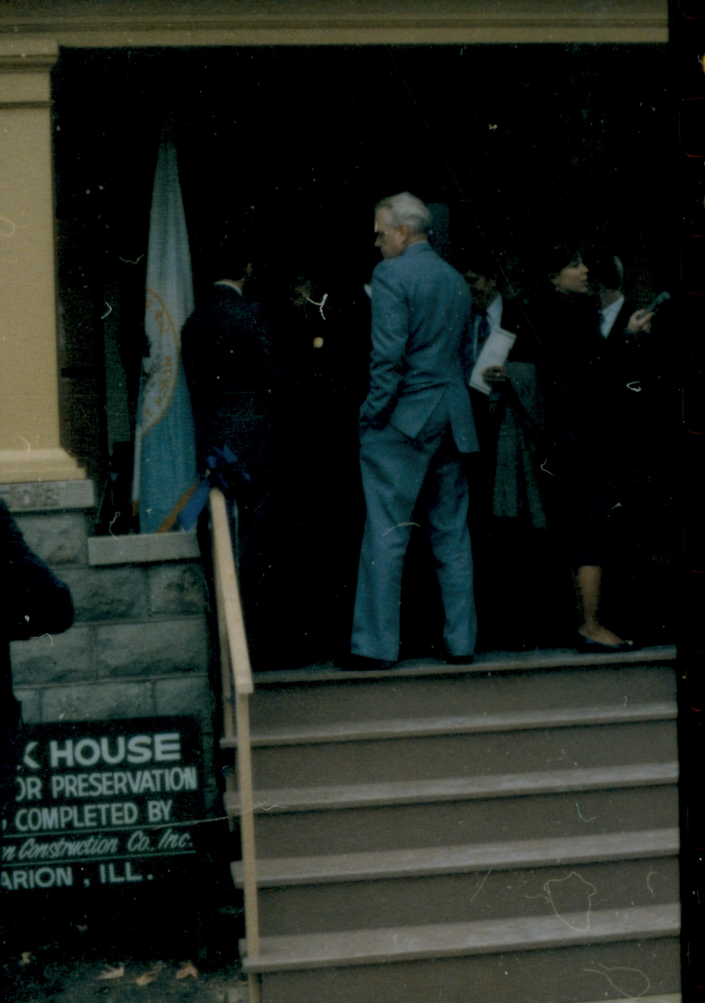 Visitors on porch. Lincoln Home NHS- Cook House Re-opening, 2 Cook, ceremony