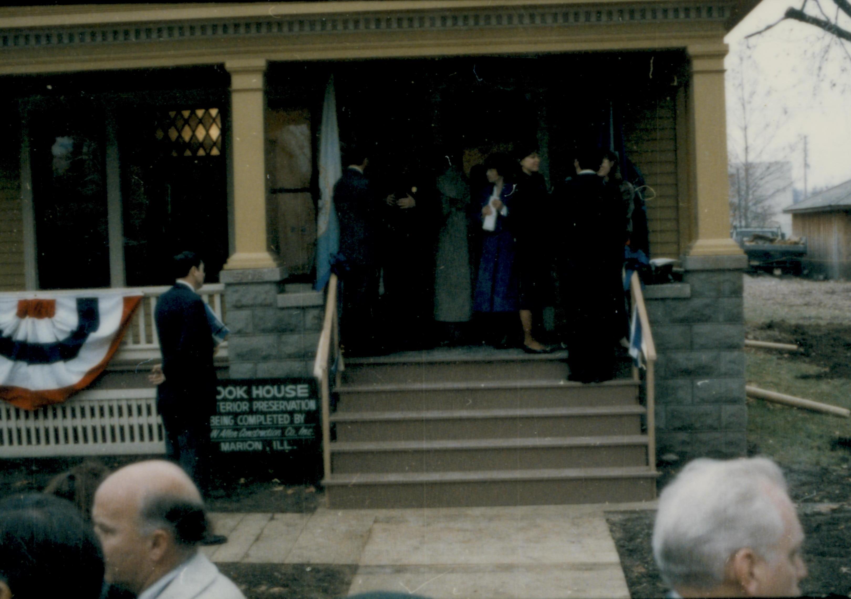 Visitors on porch. Lincoln Home NHS- Cook House Re-opening, 2 Cook, ceremony