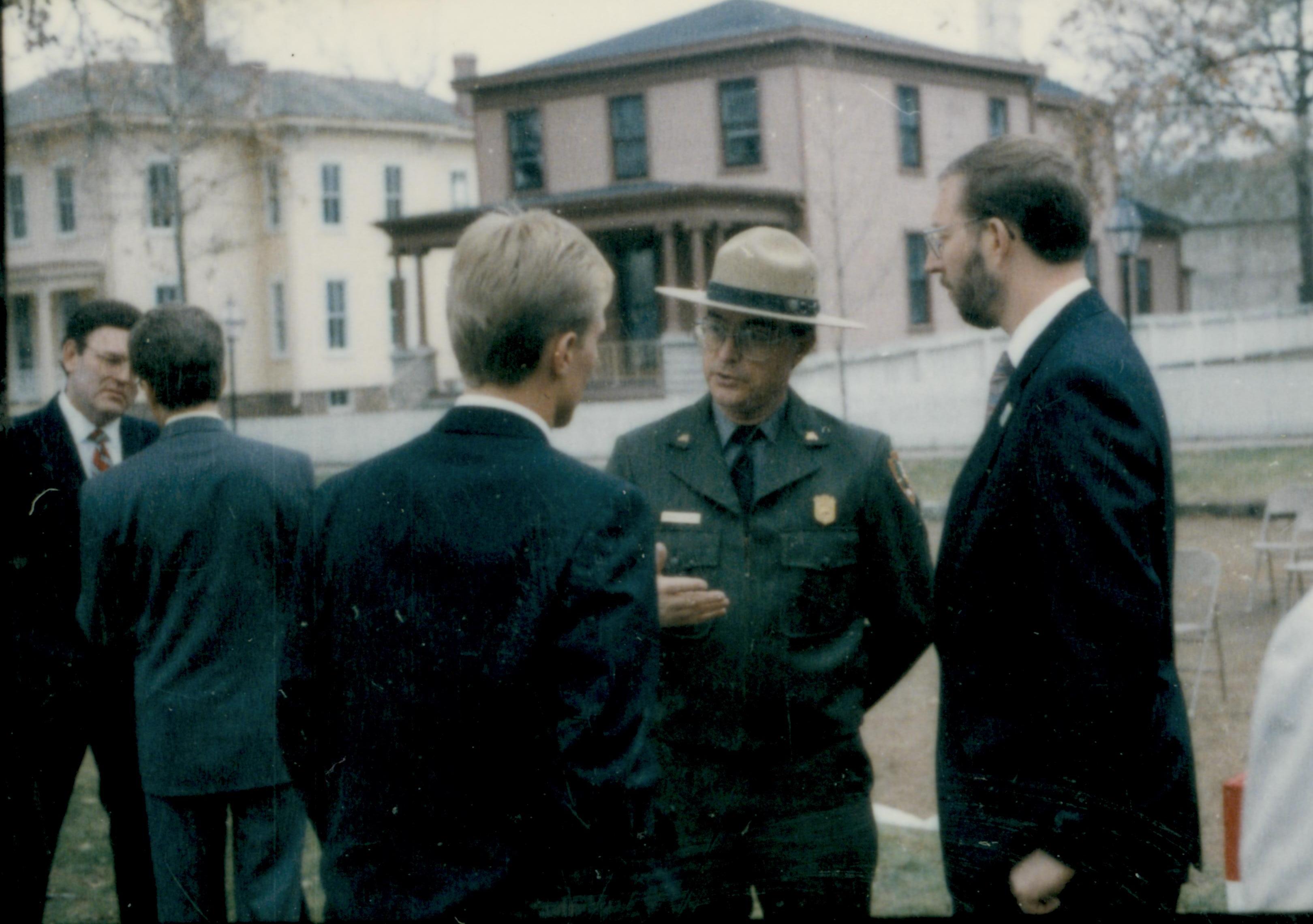 Five men standing & talking to each other. Lincoln Home NHS- Cook House Re-opening, 2 Cook, ceremony, tour