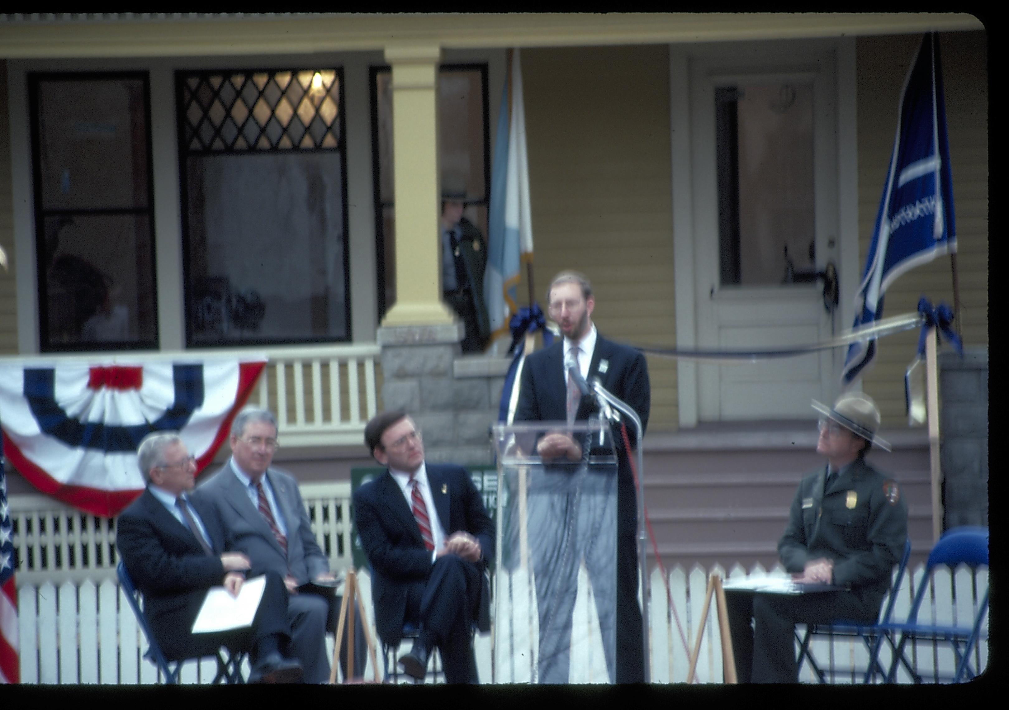 Five men on platform in front of Cook house. Lincoln Home NHS- Cook House Re-opening  Cook, ceremony