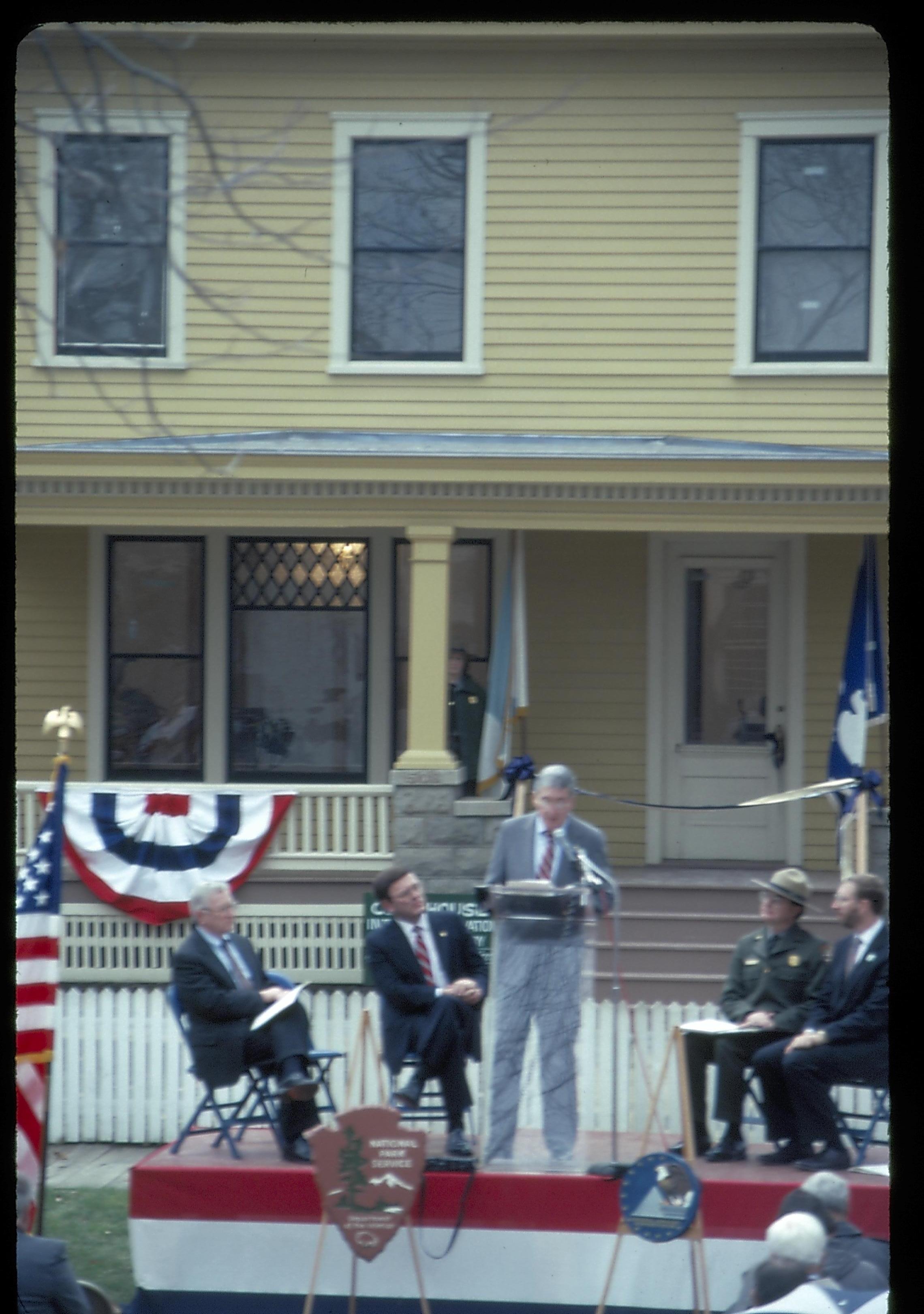 Five men on speakers platform in front of Cook house Lincoln Home NHS- Cook House Re-opening  Cook, ceremony