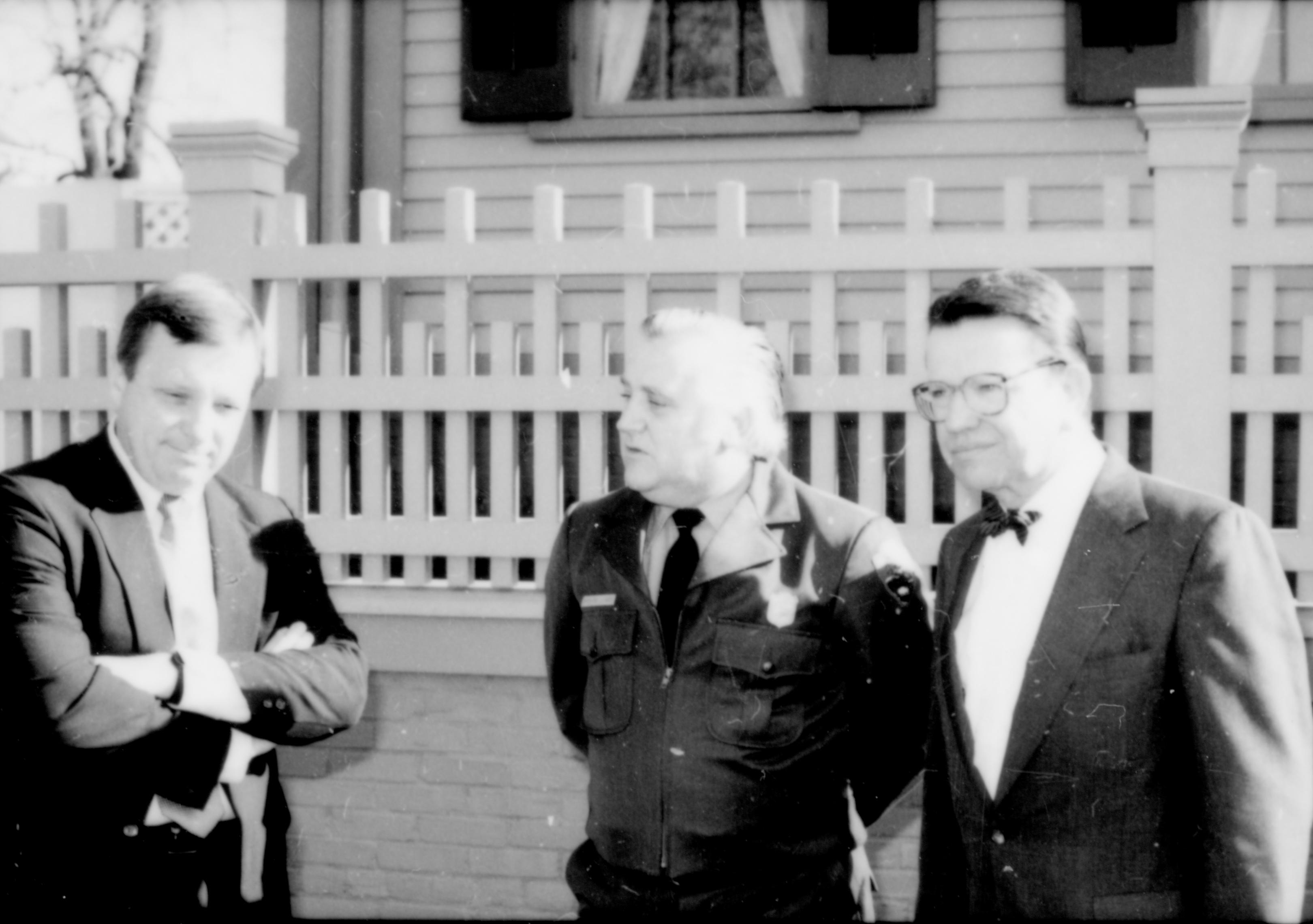 Three men in front of fence. Lincoln Home NHS- Durbin and Simon, 77 Durbin, Simon, visit, media