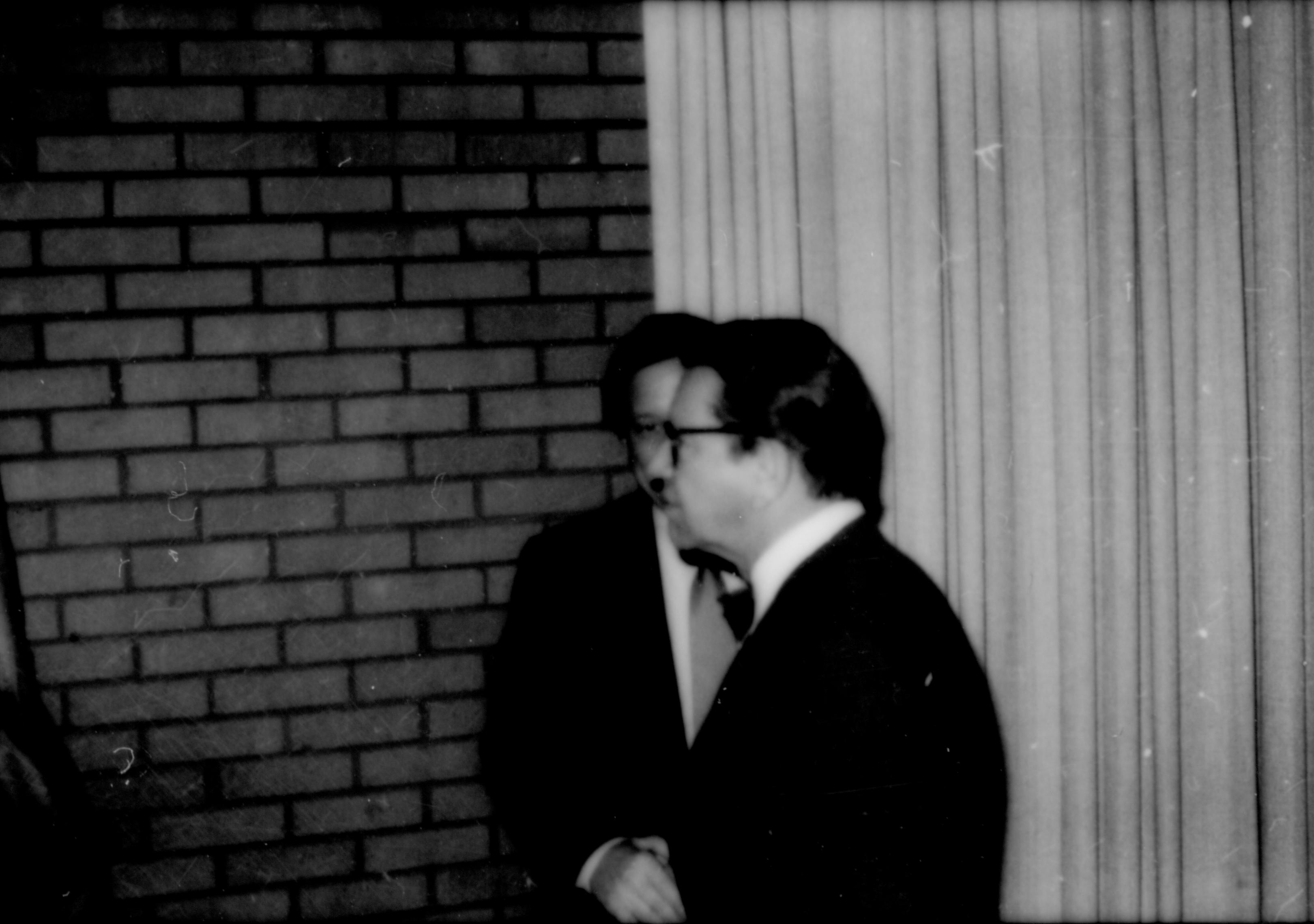 Man standing in front of brick wall& curtin. Lincoln Home NHS- Durbin and Simon, 78 Durbin, Simon, visit