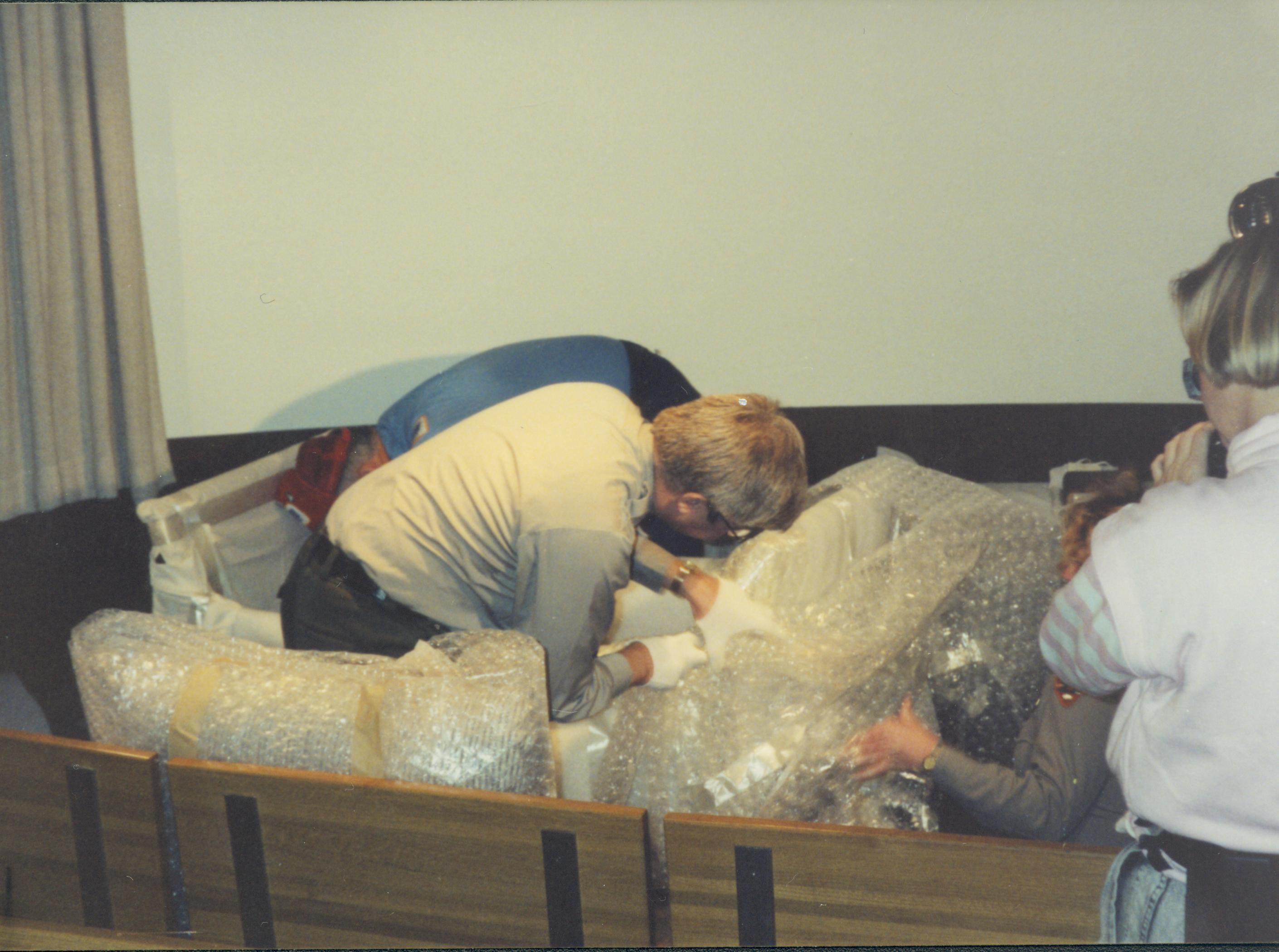 Men unpacking furniture. Lincoln Home NHS- Bring Furniture Back Home, 313194 furniture