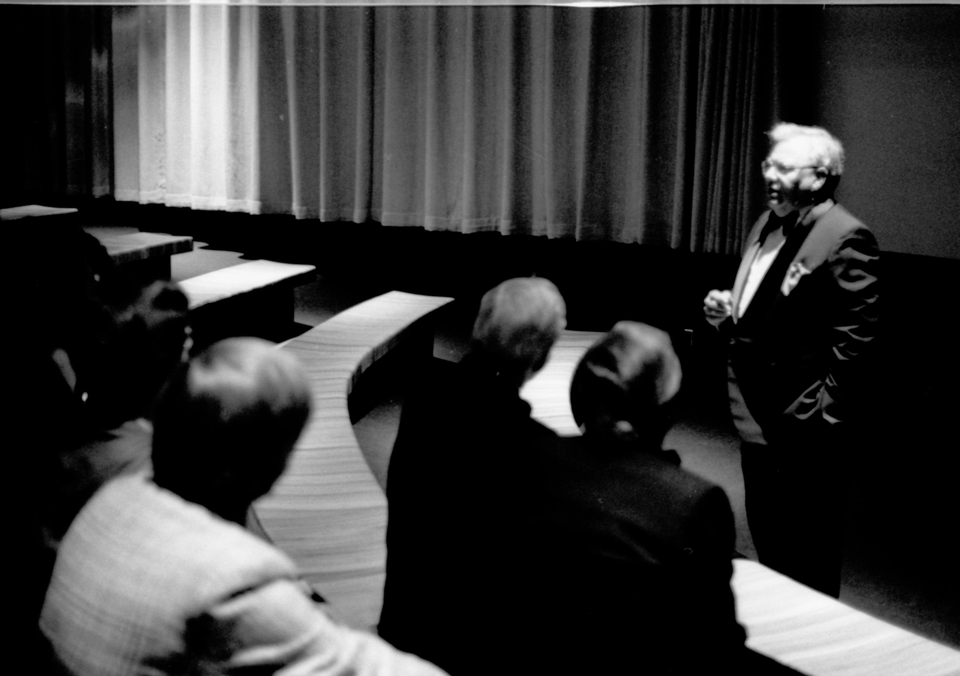 Man speaking to people seated in benches. Lincoln Home NHS- Paul Findley visit to LIHO Finley, visit, banquet